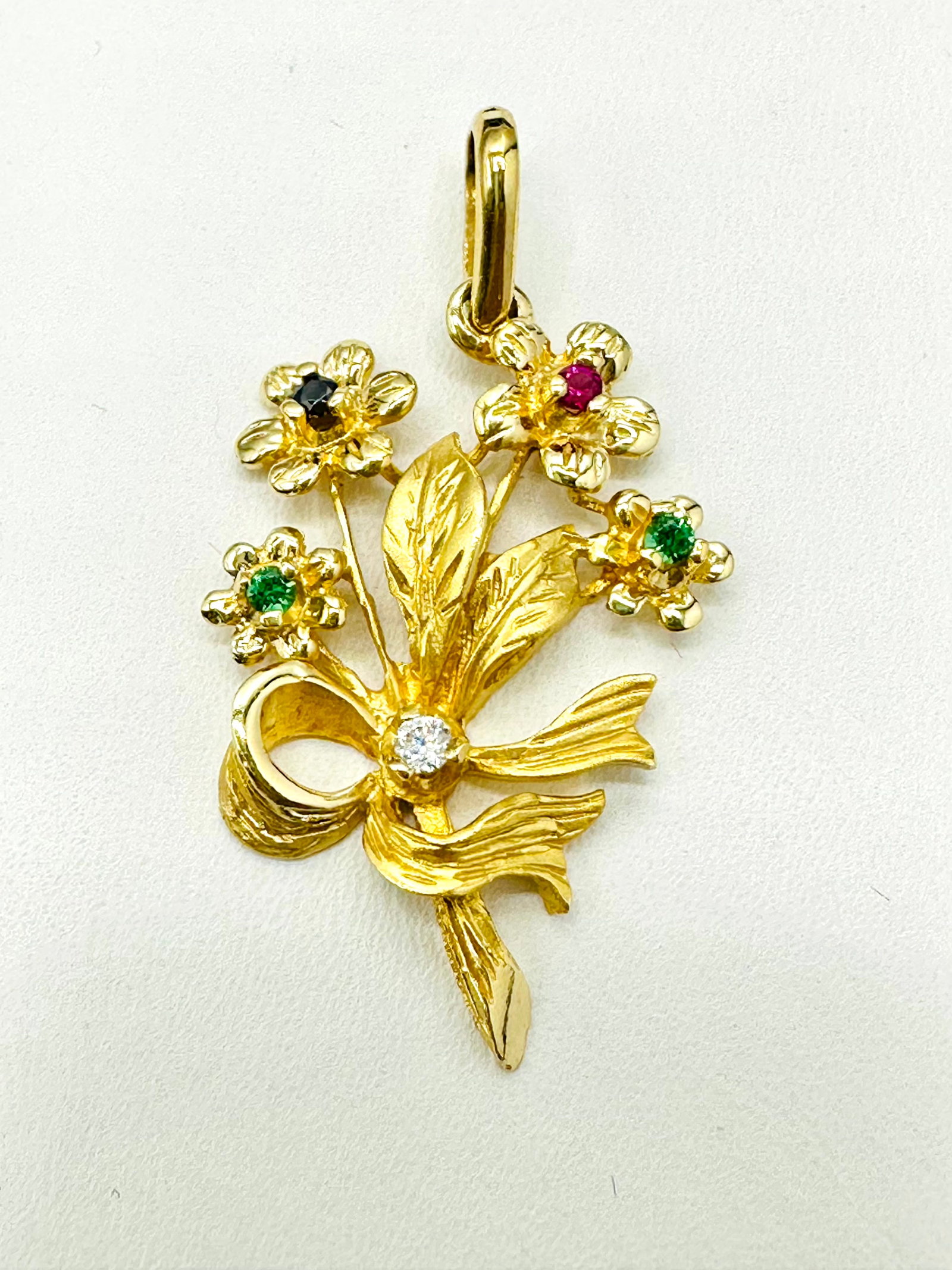 14KT Yellow Gold Multi Color Stone Pendant #2260: #2260 14KT Yellow Gold Multi Color Stone Pendant 5 pieces of stone Pendant Weight: 2.90 grams Pendant size: 35 mm x 19 mm