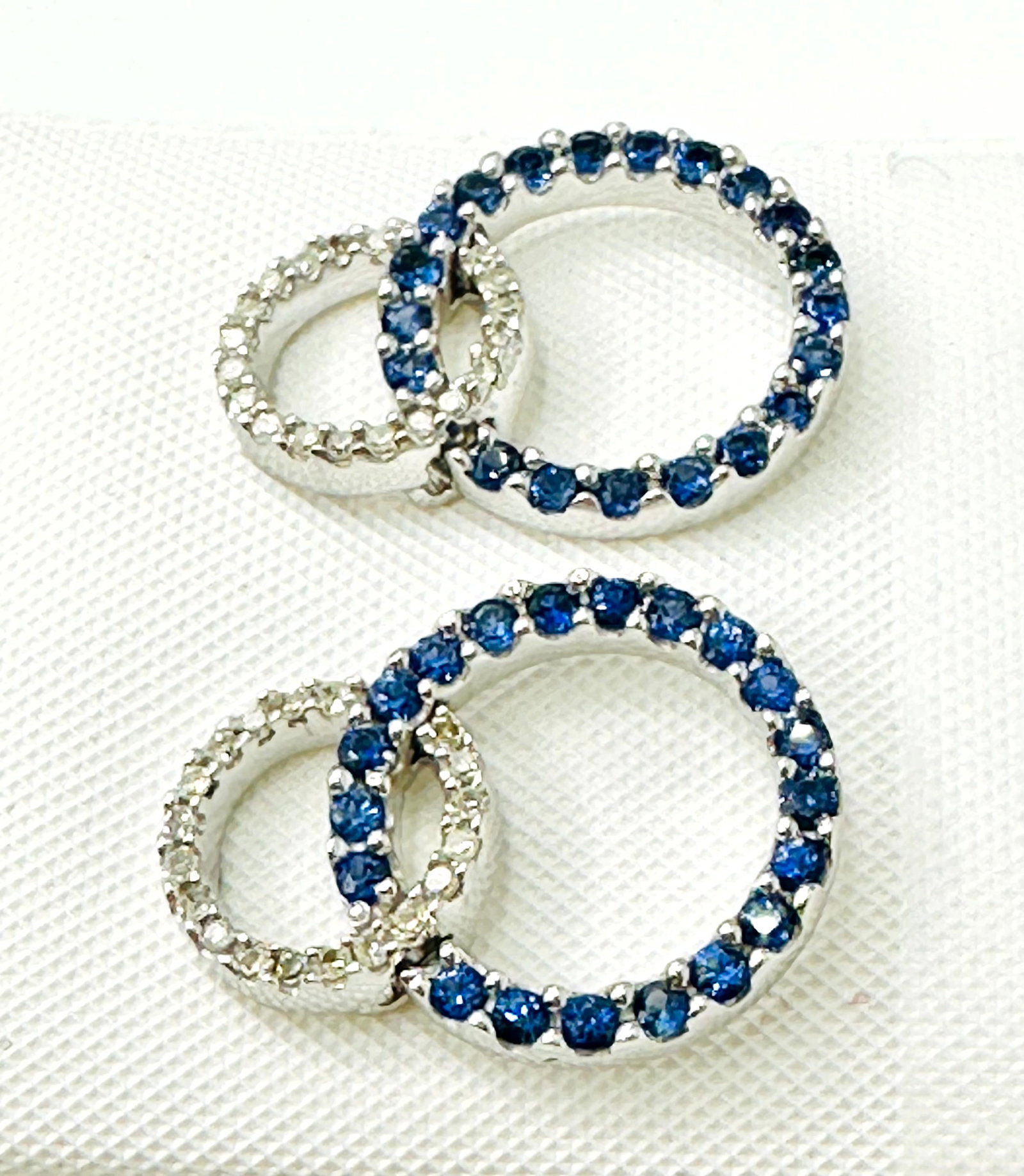 Pair of Natural Diamond and Sapphire Earrings, 14KT White Gold # 2271: # 2271 Pair of Natural Diamond and Sapphire Earrings, 14KT White Gold 38 pieces diamond 0.20 carat(t.w.) 40 pieces sapphire 1.00 carat(t.w.) Earrings Weight: 3.60 Grams Earrings Size 18 mm X 13.50 mm