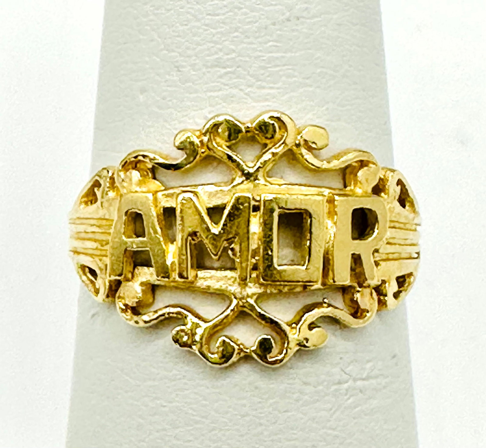 14KT Yellow Gold AMOR Ring # 2274: # 2274 14KT Yellow Gold AMOR Ring Diamond Cut Ring Weight: 1.10 Grams Ring Size 6.25