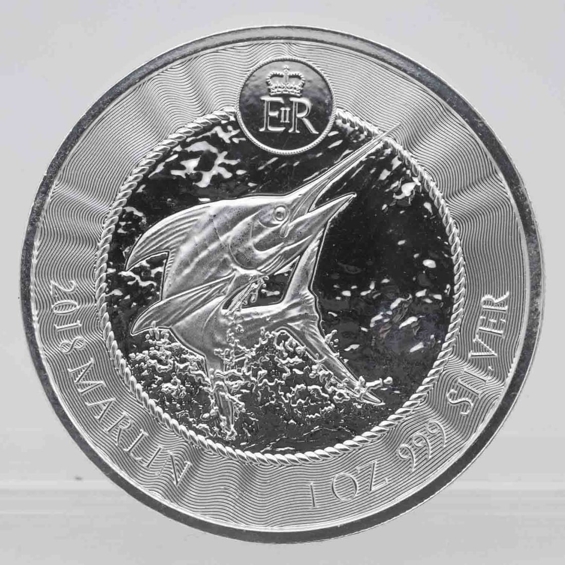2018 Cayman Islands Marlin 1oz Silver Coin: MLC01159 Subject: Cayman Islands Marlin 1oz Silver Coin Medium: 999 Silver Year: 2018 Condition: MS, Proof Note: Any condition statement is given as an opinion and should not be treated as a statement