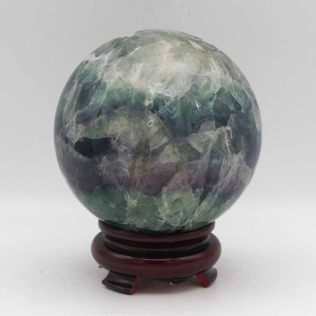 Polished Natural Rainbow Fluorite Sphere With Stand: Medium: Rainbow Fluorite Size: 3.7x3.7x5 inches Age/Detail: Polished Natural Condition: great overall, check photo for condition reference. Provenance: Collection from Estate in Williamsburg LiveShipp