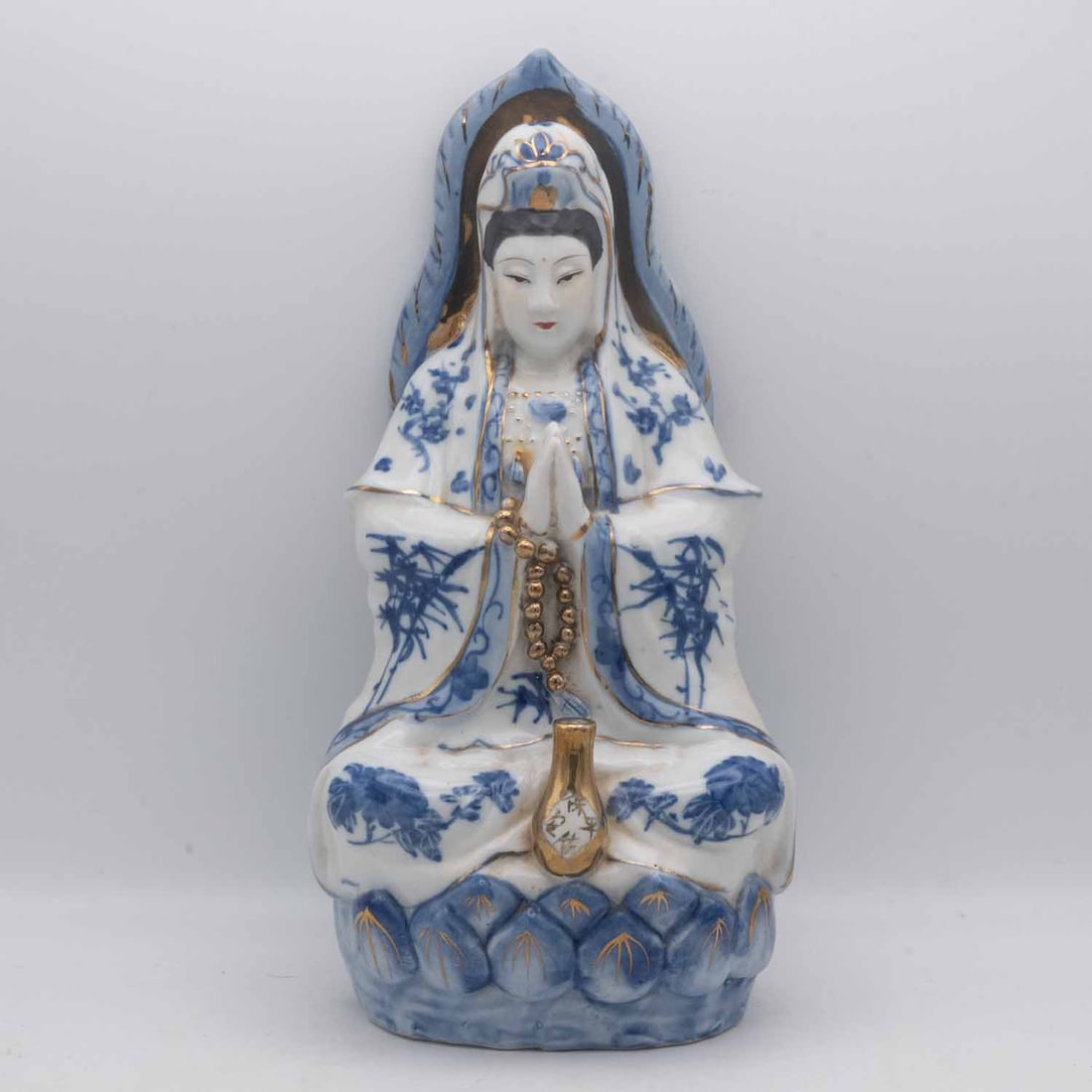 Vintage Chinese Blue And White Gilted Porcelain Guanyin Figure: Medium: Blue And White Gilted Porcelain Size: 5x4x10.5 inches Age/Detail: Vintage Chinese Condition: great overall, check photo for condition reference. Provenance: Collection from Estate in Williamsb