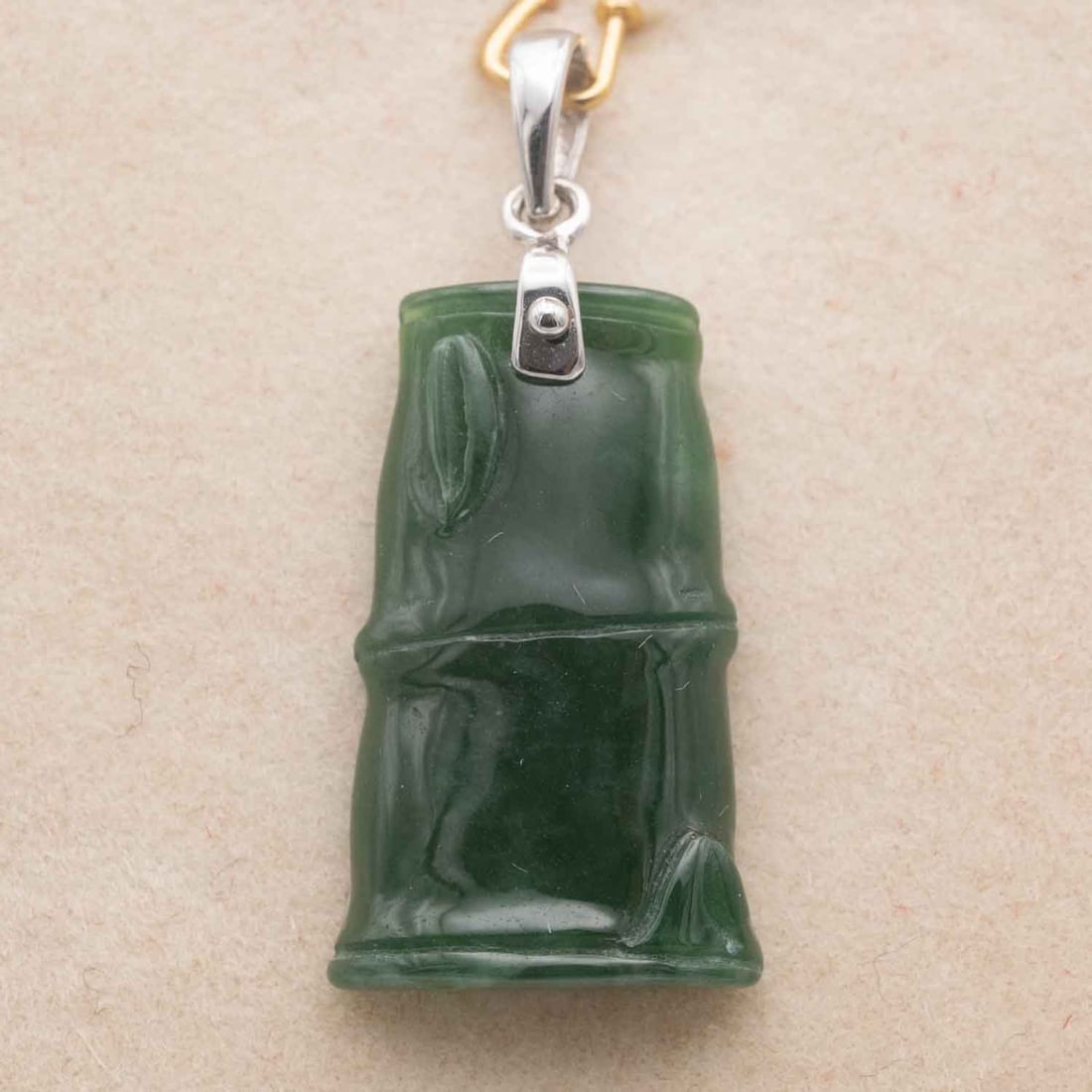 Chinese Carved Natural Icy Green Jadeite Bamboo Pendant With 14k Gold Latch: Medium: Natural Icy Green Jadeite Size: 0.8x0.5x0.2 inches Age/Detail: Chinese Carved Condition: great overall, check photo for condition reference. Provenance: Collection from Estate in Tribecca Live