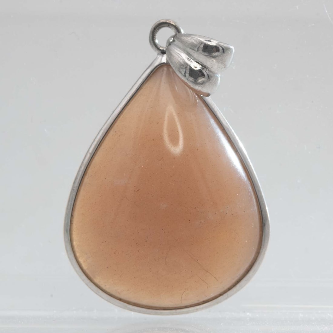 Sterling Silver Bezel Natural Rose Quartz Teardrop Pendant: Medium: Natural Rose Quartz Size: 1.2x1x0.3 inches Age/Detail: Sterling Silver Bezel Condition: great overall, check photo for condition reference. Provenance: Collection from Estate in Williamsburg L