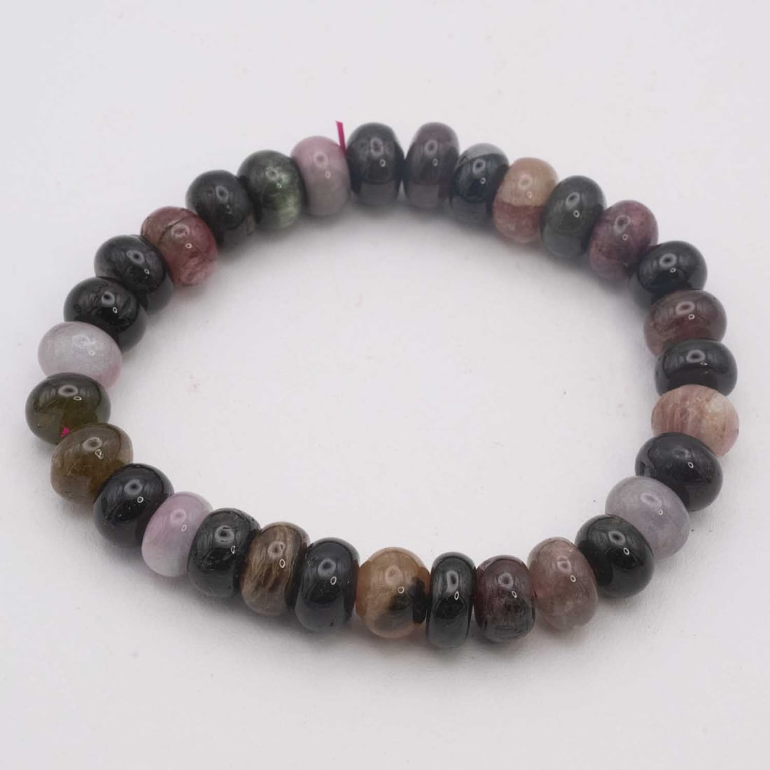 Natural Multi Color Tourmaline Bead Bracelet: Medium: Tourmaline Size: 9x6mm Age/Detail: Natural Multi Color Condition: great overall, check photo for condition reference. Provenance: Collection from Estate in Williamsburg LiveShipping is NOT a p