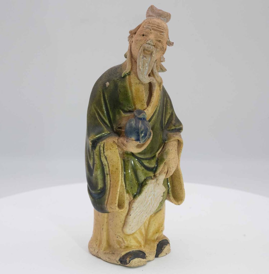 Vintage Chinese Porcelain Daoist Immortal Figure: Medium: Porcelain Size: 2x2x5 inches Age/Detail: Vintage Chinese Condition: great overall, check photo for condition reference. Chinese pottery figure of a Daoist immortal, sancai-style glaze, 20th ce