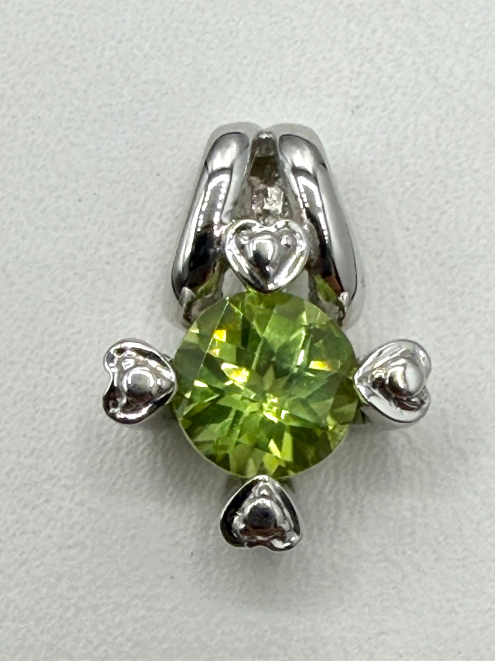 14KT White Gold # 2848: # 2848 14KT White Gold 1 piece peridot Pendant Weight: 2.2 grams(t.w.) Pendant Size: 16 mm x 12 mm