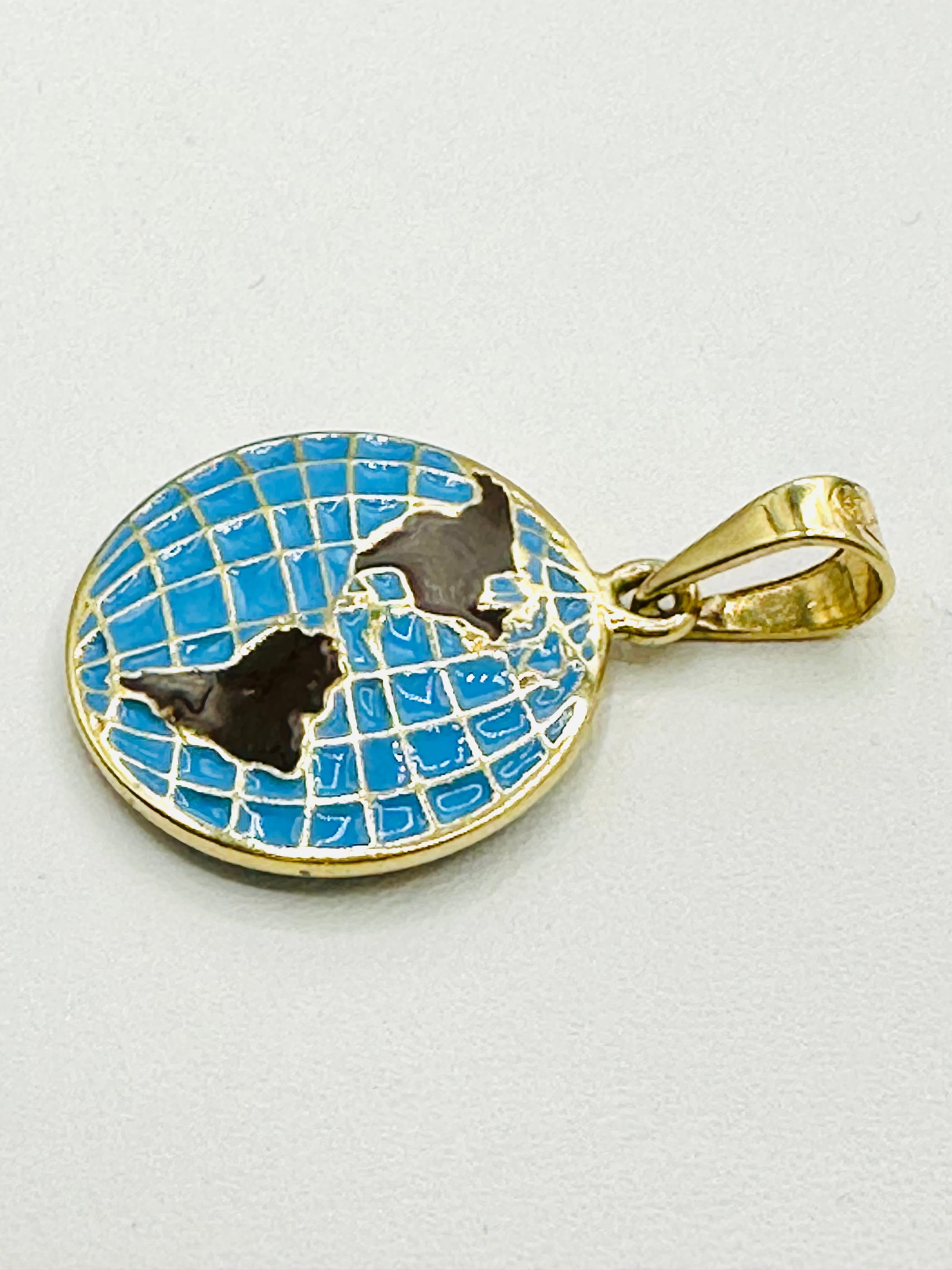 14KT Yellow Gold Double Sized Globe Pendant with Enamel # 2310: # 2310 14KT Yellow Gold Double Sized Globe Pendant with Enamel Pendant Weight: 3.60 grams 12 mm diameter