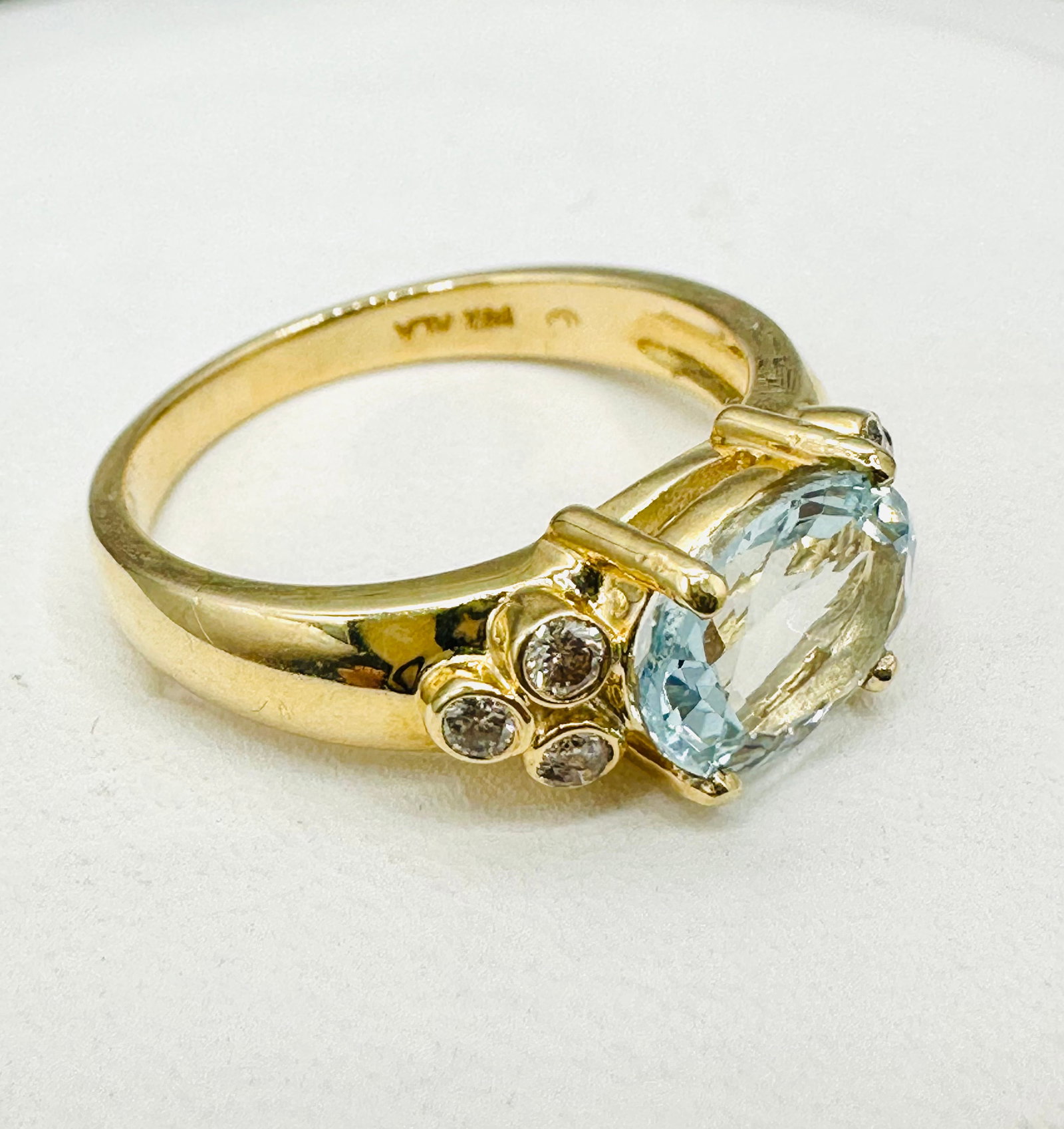 Natural Diamond and Gemstone Ring, 14KT Yellow Gold # 2384: # 2384 Natural Diamond and Gemstone Ring, 14KT Yellow Gold 6 pieces diamond 0.16 carat(t.w.) 1 piece oval Aquamarine Ring Weight: 4.10 grams(t.w.) Ring Size: 7.25