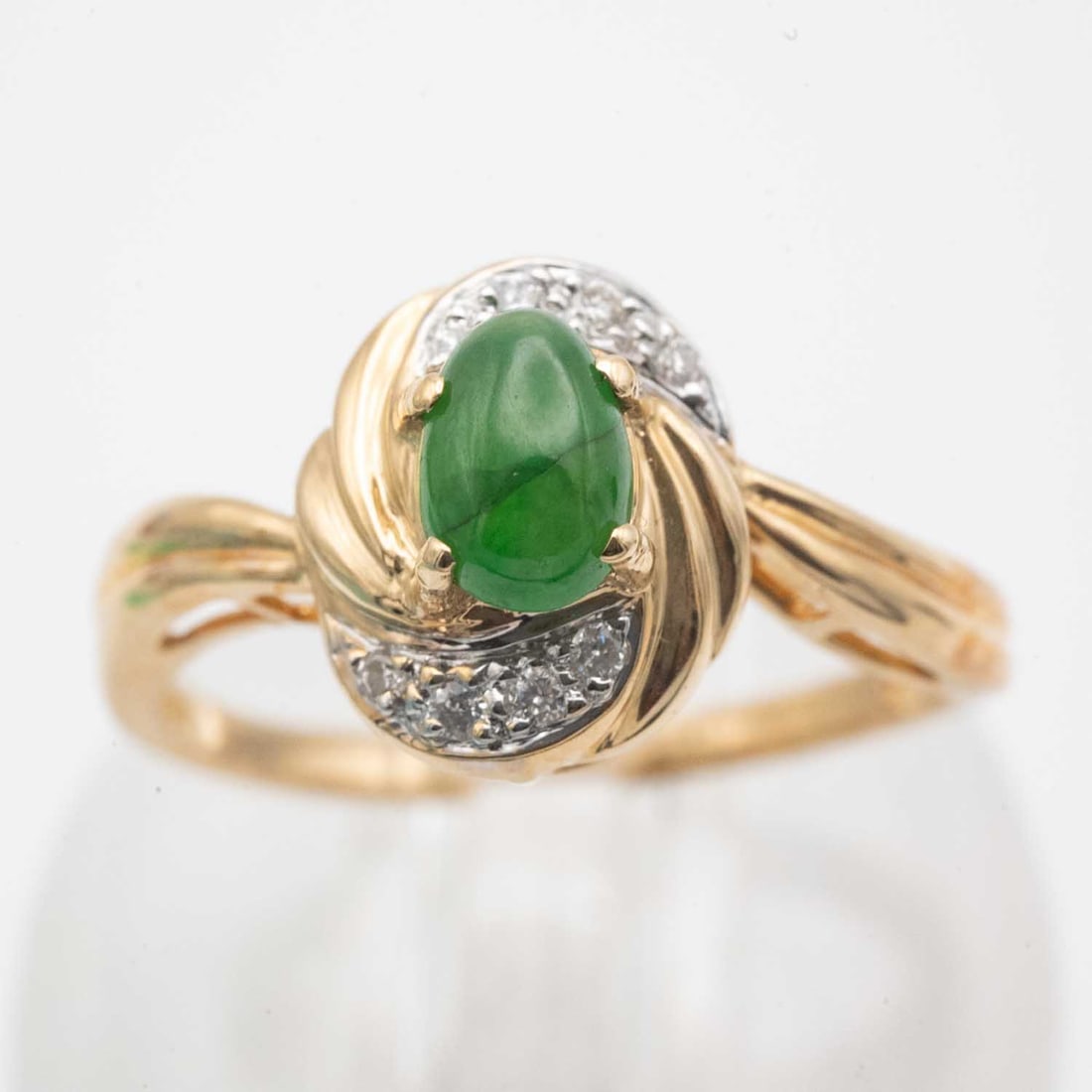 14K Gold And Diamond Cabochon Natural Green Jadeite Ring: Medium: Cabochon Natural Green Jadeite Size: US 6.5, 3 gram Age/Detail: 14K Gold And Diamond Condition: great overall, check photo for condition reference Provenance: Collection from Estate in Tribecc