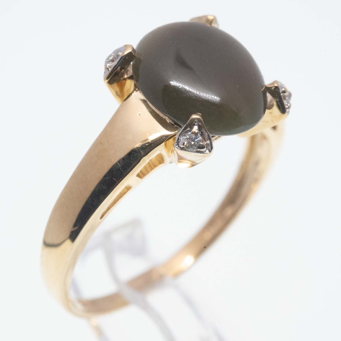 14K Gold And Diamond Natural Cabochon Jadeite Ring: Medium: Natural Cabochon Jadeite Size: 7 US Age/Detail: 14K Gold And Diamond Condition: Great Provenance: Collection from Estate in Tribecca Please view all the photos as they are part of the conditio