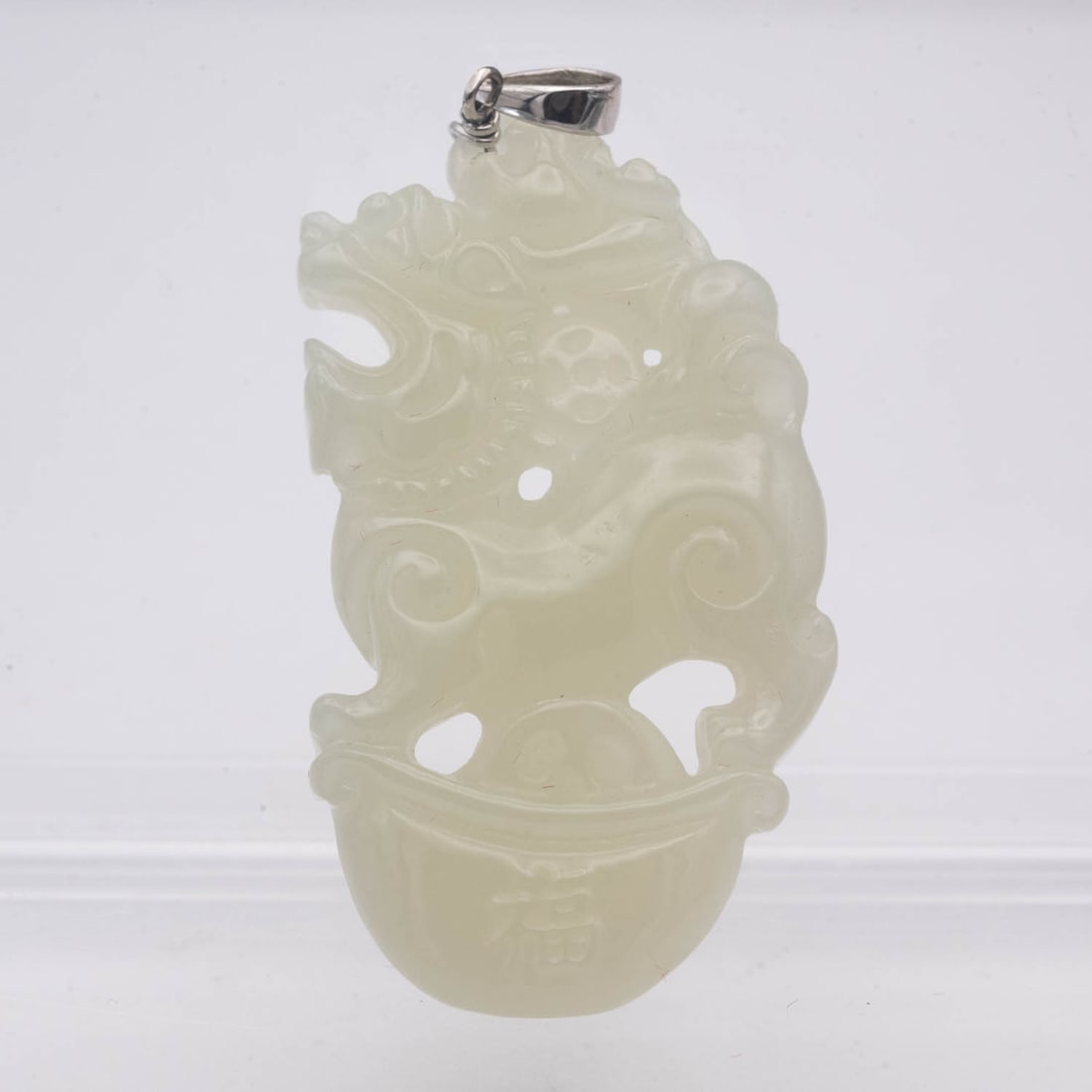 Chinese Carved Natural Icy Jadeite Mythical Beast Pendant: Medium: Natural Icy Jadeite Size: 1.7x1x0.3 inches Age/Detail: Chinese Carved Condition: great overall, check photo for condition reference. Provenance: Collection from Estate in Tribecca
