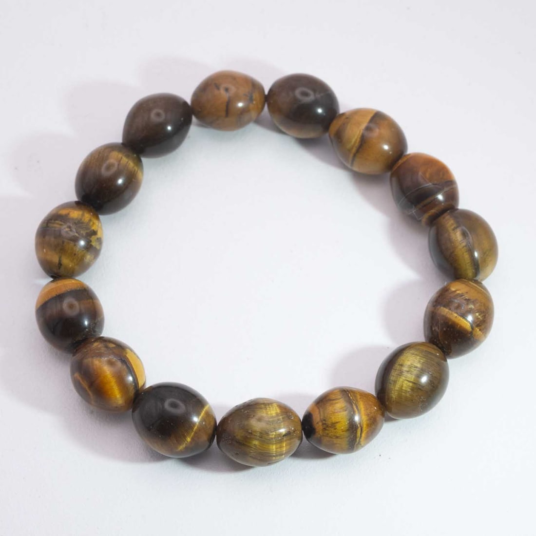 Natural Tiger's Eye Gemstone Pendant: Medium: Tiger's Eye Size: 10x12mm Age/Detail: Natural Condition: great overall, check photo for condition reference. Provenance: Collection from Estate in Williamsburg LiveShipping is NOT a part of