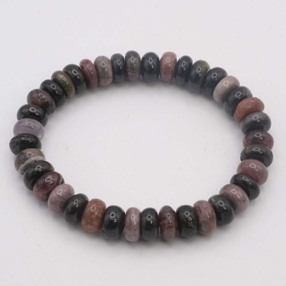 Natural Multi Color Tourmaline Bead Bracelet: Medium: Tourmaline Size: 9x5mm Age/Detail: Natural Multi Color Condition: great overall, check photo for condition reference. Provenance: Collection from Estate in Williamsburg LiveShipping is NOT a p