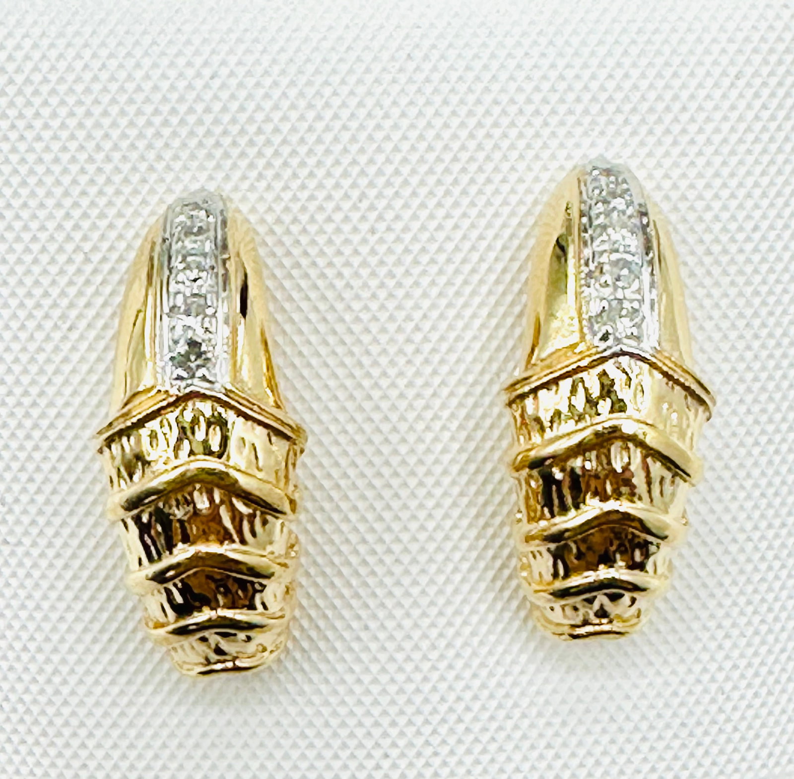 Pair of Natural Diamond Earrings, 14KT Yellow Gold # 2534: # 2534 Pair of Natural Diamond Earrings, 14KT Yellow Gold 10 pieces diamond 0.06 carat(t.w.) Earrings Weight: 4.90 grams(t.w.) Post backs Earrings Size: 18.5 mm X 7.5 mm