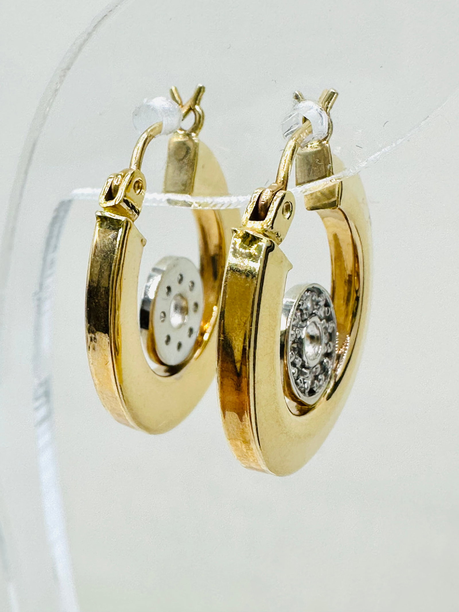 Pair of Natural Diamond Polished Square Hoops Earrings, 14KT Yellow and White Gold # 2571: # 2571 Pair of Natural Diamond Polished Square Hoops Earrings, 14KT Yellow and White Gold 16 pieces diamond 0.12 carat(t.w.) Earrings Weight: 2.90 grams(t.w.) Click-Top Closure Earrings Size: 20 mm X2