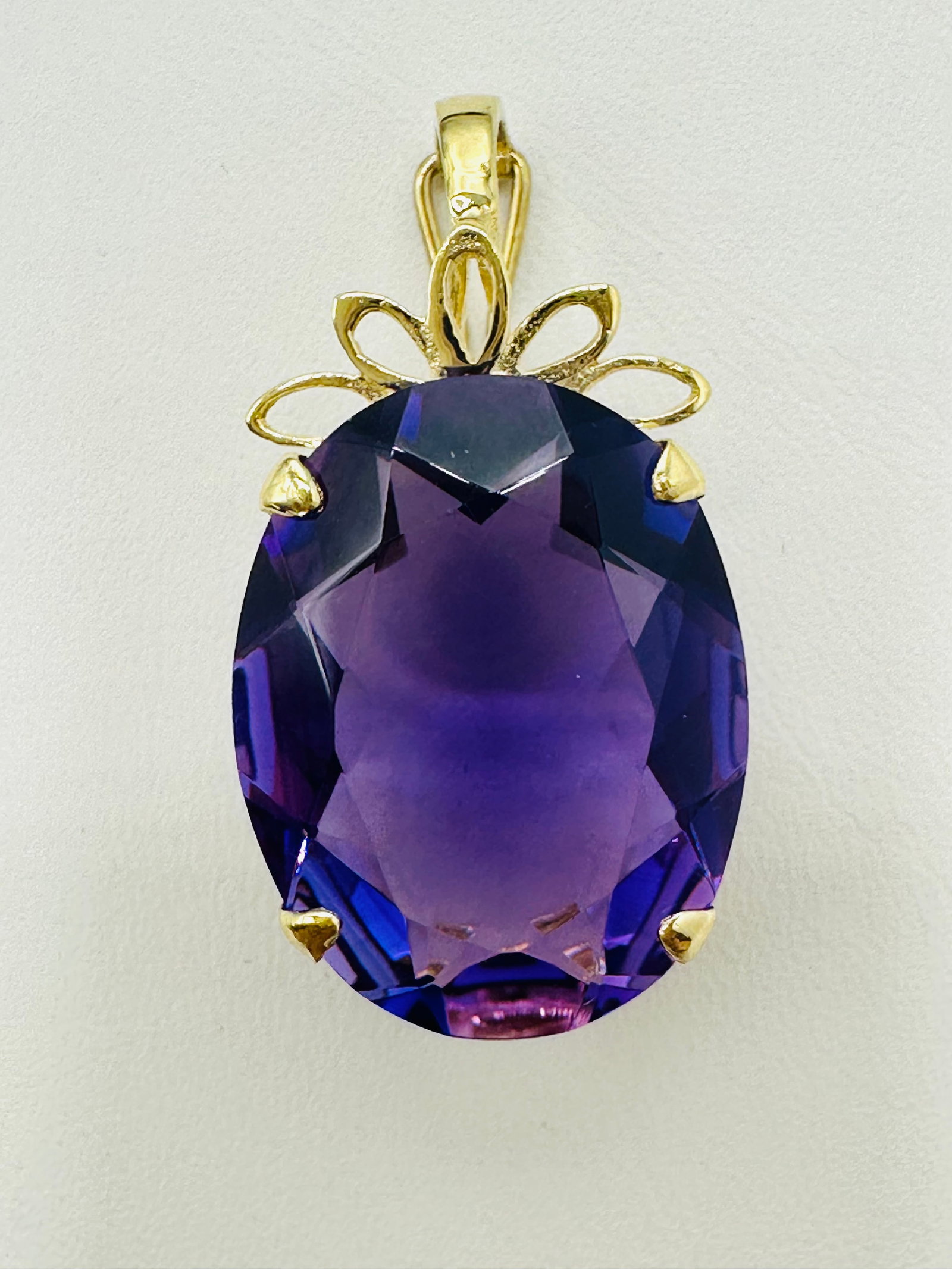 14KT Yellow Gold Amethyst Pendant # 2730: # 2730 14KT Yellow Gold Amethyst Pendant 1 piece big oval amethyst Pendant Weight: 5.9 grams (t.w.) Pendant size: 32 mm X 17 mm