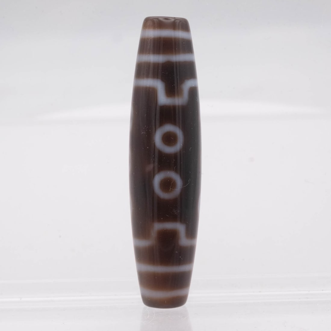 Chinese Tibetan Dzi Bead: Medium: Dzi Size: 2.3x0.6 inches Age/Detail: Chinese Tibetan Condition: great overall, check photo for condition reference. Provenance: Collection from Estate in Tribecca LiveShipping is NOT a part of