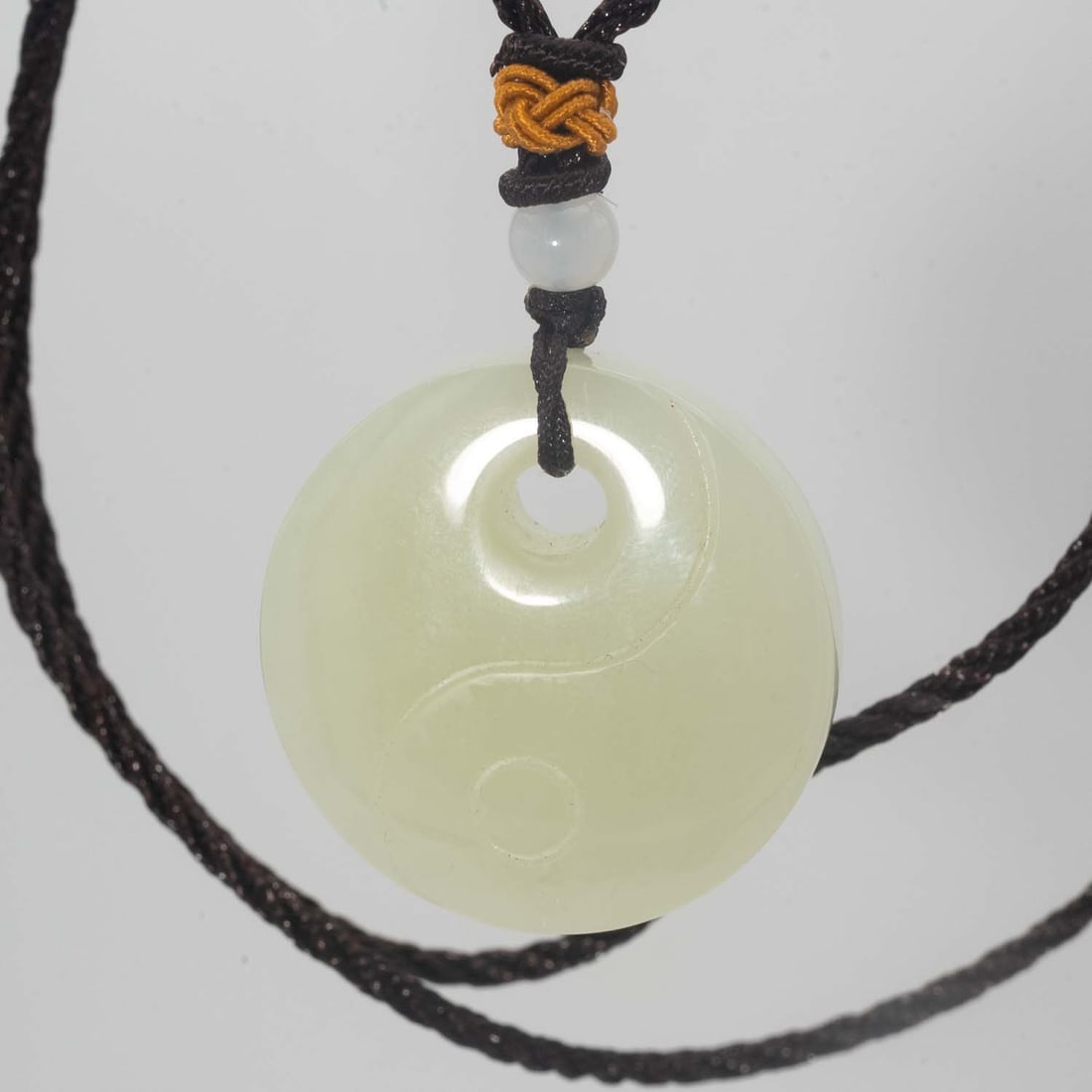 Vintage Chinese Pale Green Nephrite Yin-Yang Disc Pendant: Medium: Pale Green Nephrite Size: 1.3x1.3x0.3 inches Age/Detail: Vintage Chinese Condition: great overall, check photo for condition reference. Provenance: Collection from Estate in Williamsburg LiveS