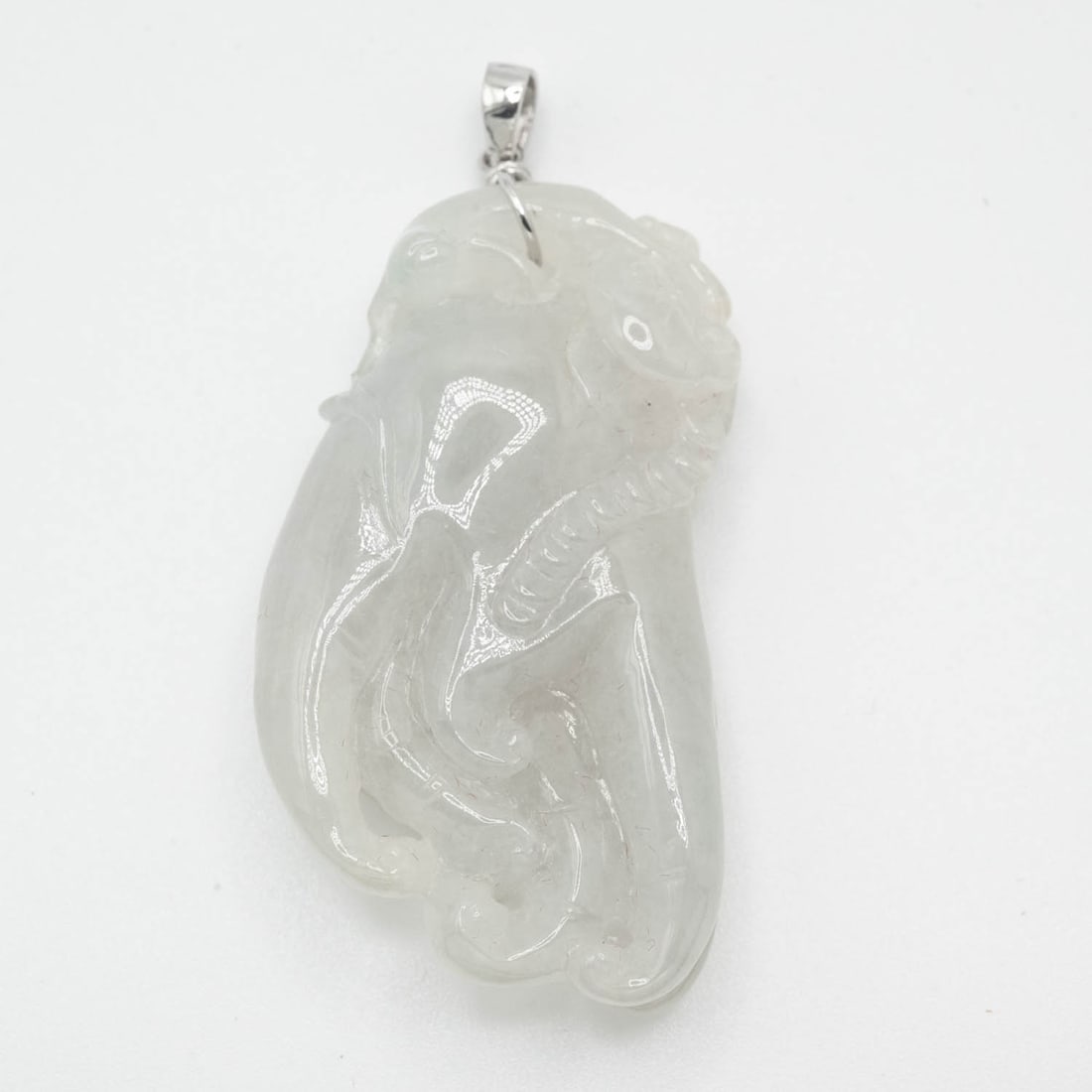 14k White Gold Latch Icy White Jadeite Buddha's Hand Pendant: Medium: Icy White Jadeite Size: 2x1 inches Age/Detail: 14k White Gold Latch Condition: Great, check photo for detail Provenance: Collection from Estate in Tribecca Please view all the photos as they a