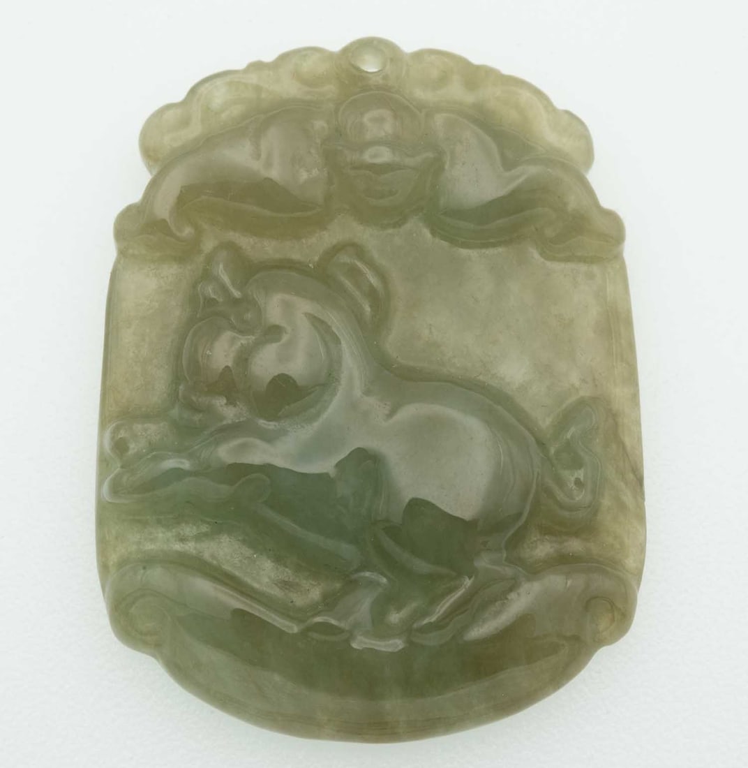 Carved Green Jade Beast Pendant: Medium: Green Jade Size: 1.5x1 inches Age/Detail: Carved Condition: Great, check photo for detail Provenance: Collection from Estate in Tribecca Please view all the photos as they are part of the cond