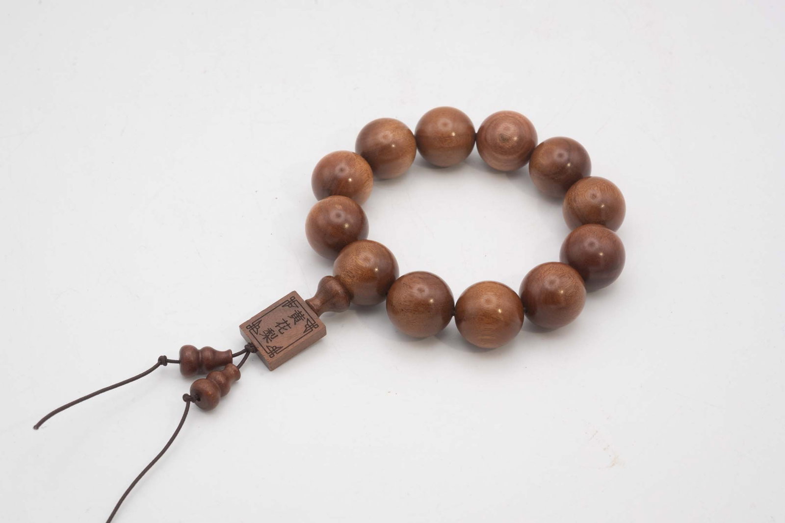 Chinese Huanghuali Wood Bead Bracelet: Medium: Huanghuali Size: 0.7 inches per bead Age/Detail: Chinese Condition: great overall, check photo for condition reference. Provenance: Collection from Estate in Williamsburg LiveShipping is NOT a