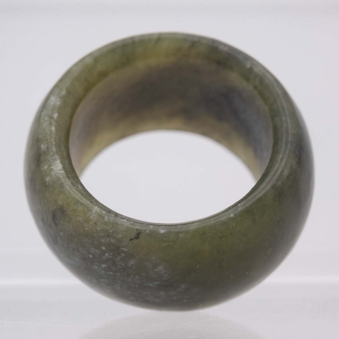 Chinese Carved Natural Icy Green Jadeite Ring: Medium: Natural Icy Green Jadeite Size: 0.7 inches Age/Detail: Chinese Carved Condition: great overall, check photo for condition reference. Provenance: Collection from Estate in Tribecca LiveShipping