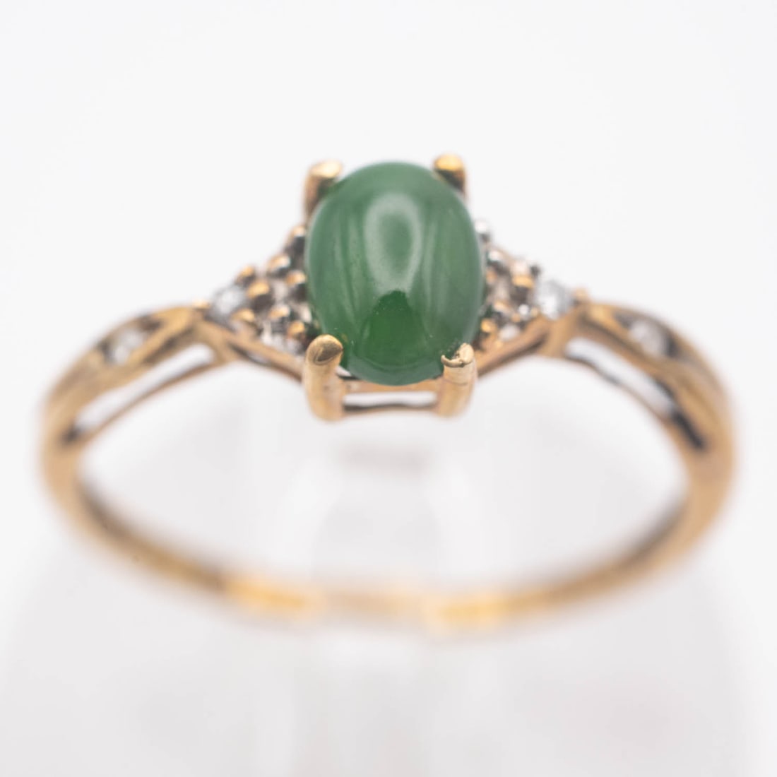 10K Gold Natural Glassy Green Jadeite Ring: Medium: Natural Glassy Green Jadeite Size: US7.5, 1.3 gram Age/Detail: 10K Gold Condition: great overall, check photo for condition reference. Provenance: Collection from Estate in Tribecca LiveShippi