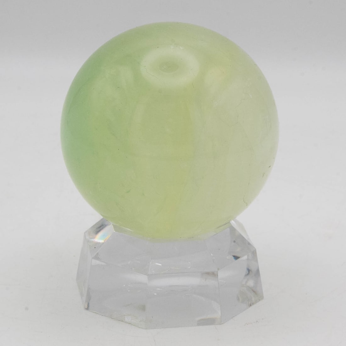 Polished Natural Green Calcite Sphere With Stand: Medium: Green Calcite Size: 2.5x2.5x3 inches Age/Detail: Polished Natural Condition: great overall, check photo for condition reference. Provenance: Collection from Estate in Williamsburg LiveShipping