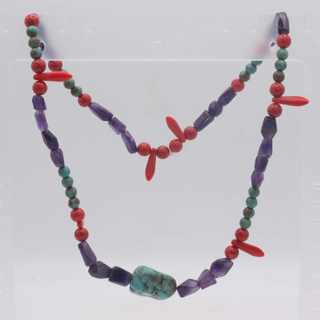 Chinese Tibetan Turquoise Amethyst Red Coral Necklace: Medium: Turquoise Amethyst Red Coral Size: 21 inches long Age/Detail: Chinese Tibetan Condition: great overall, check photo for condition reference. Provenance: Collection from Estate in Williamsburg 