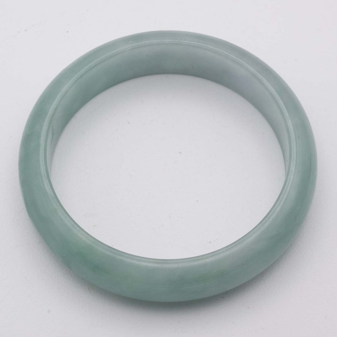 Chinese Carved Green Jade Bangle: Medium: Green Jade Size: 2.3 inches Age/Detail: Chinese Carved Condition: great overall, check photo for condition reference. Provenance: Collection from Estate in Williamsburg LiveShipping is NOT a p