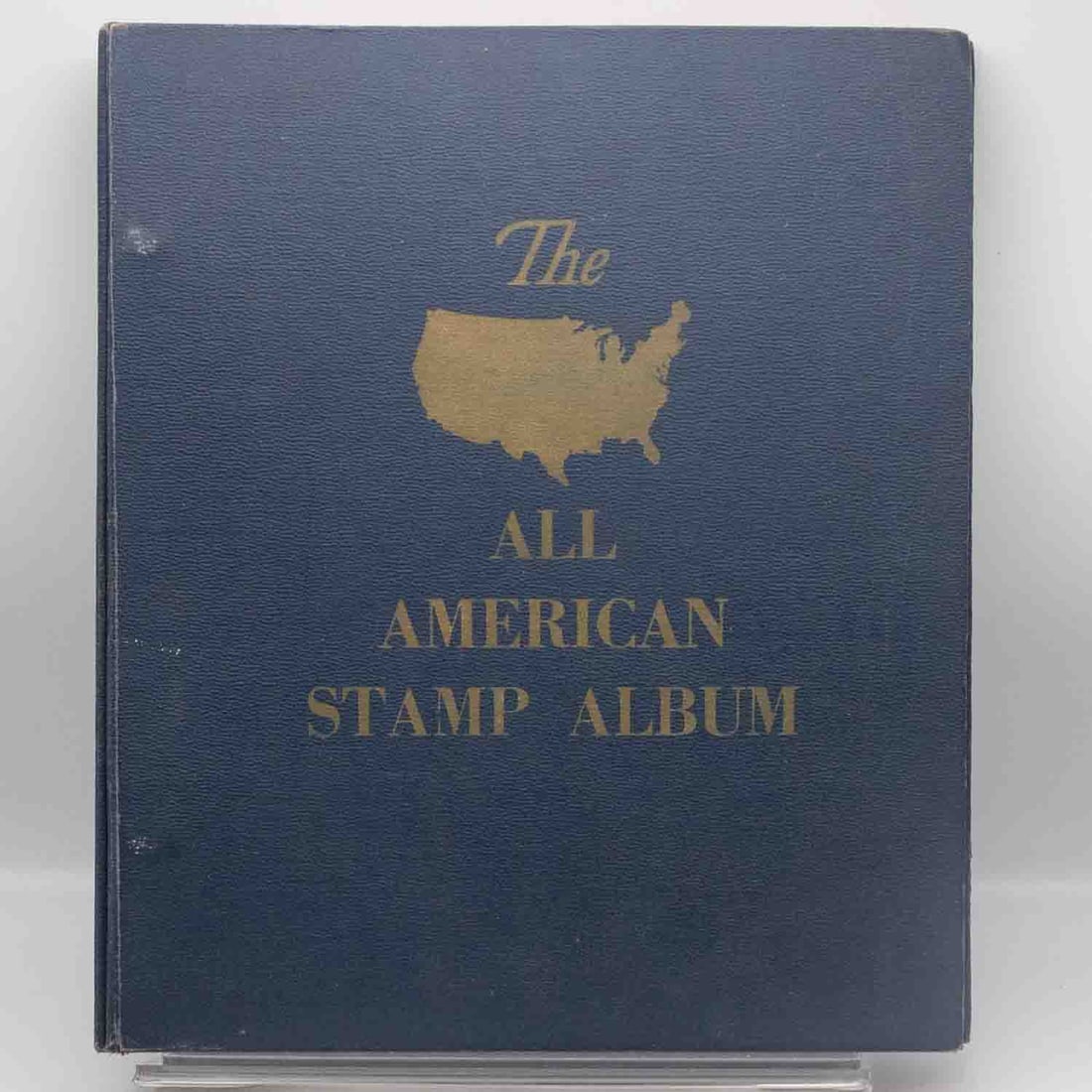 Vintage1960 Minkus All American Stamp Album with U.S. Stamps American Stamp Album: Medium: Stamp Album with U.S. Stamps Size: 10x11.6x1.6 inches Age/Detail: Vintage1960 Minkus All American Condition: great overall, check photo for condition reference. Album shows cover wear,