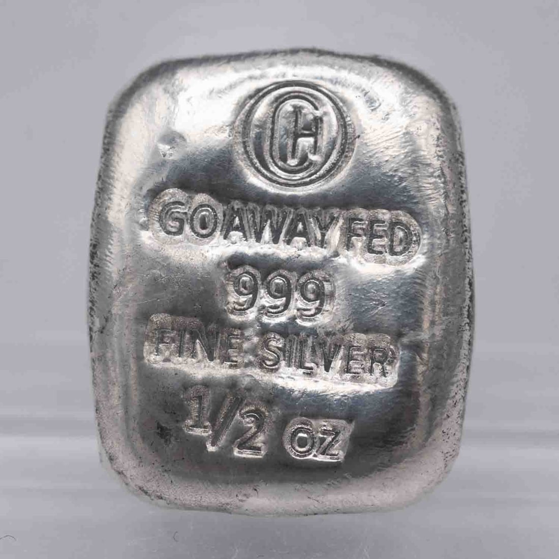 Go Away Fed Cast Poured 1/2oz Silver Bar: MLC01310 Provenance: Acquired from reputable coin dealers. Subject: Go Away Fed Cast Poured 1/2oz Silver Bar Medium: 999 Silver Year: Condition: MS Note: Any condition statement is given as an