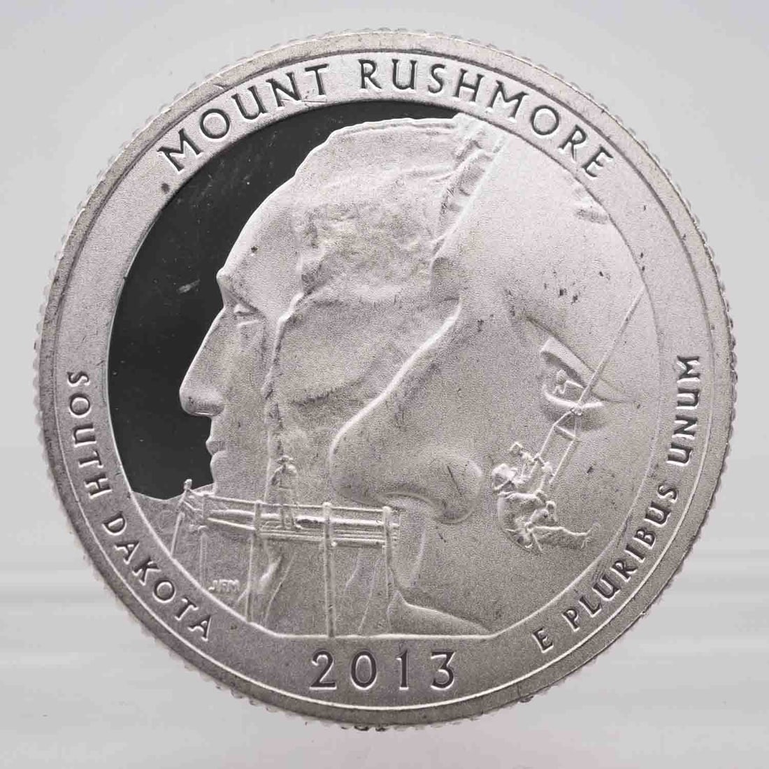 2013 American Proof ATB Silver Quarter Mount Rushmore: MLC01304 Provenance: Acquired from reputable coin dealers. Subject: American Proof ATB Silver Quarter Mount Rushmore Medium: 900 Silver Year: 2013 Condition: AU+/MS Sample photo, might have different