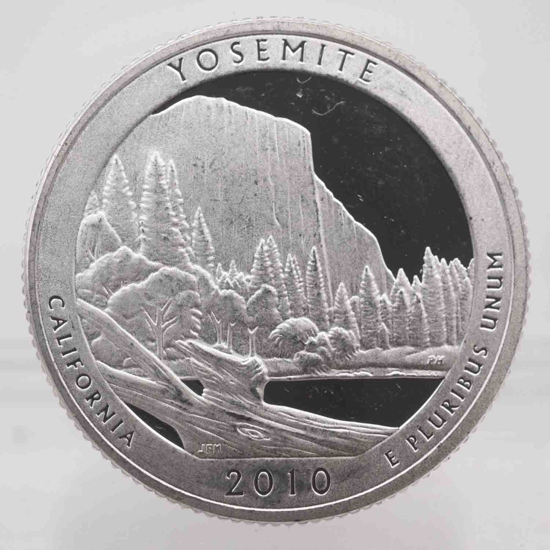 2010 American Proof ATB Silver Quarter Yosemite: MLC01300 Provenance: Acquired from reputable coin dealers. Subject: American Proof ATB Silver Quarter Yosemite Medium: 900 Silver Year: 2010 Condition: AU+/MS Sample photo, might have different