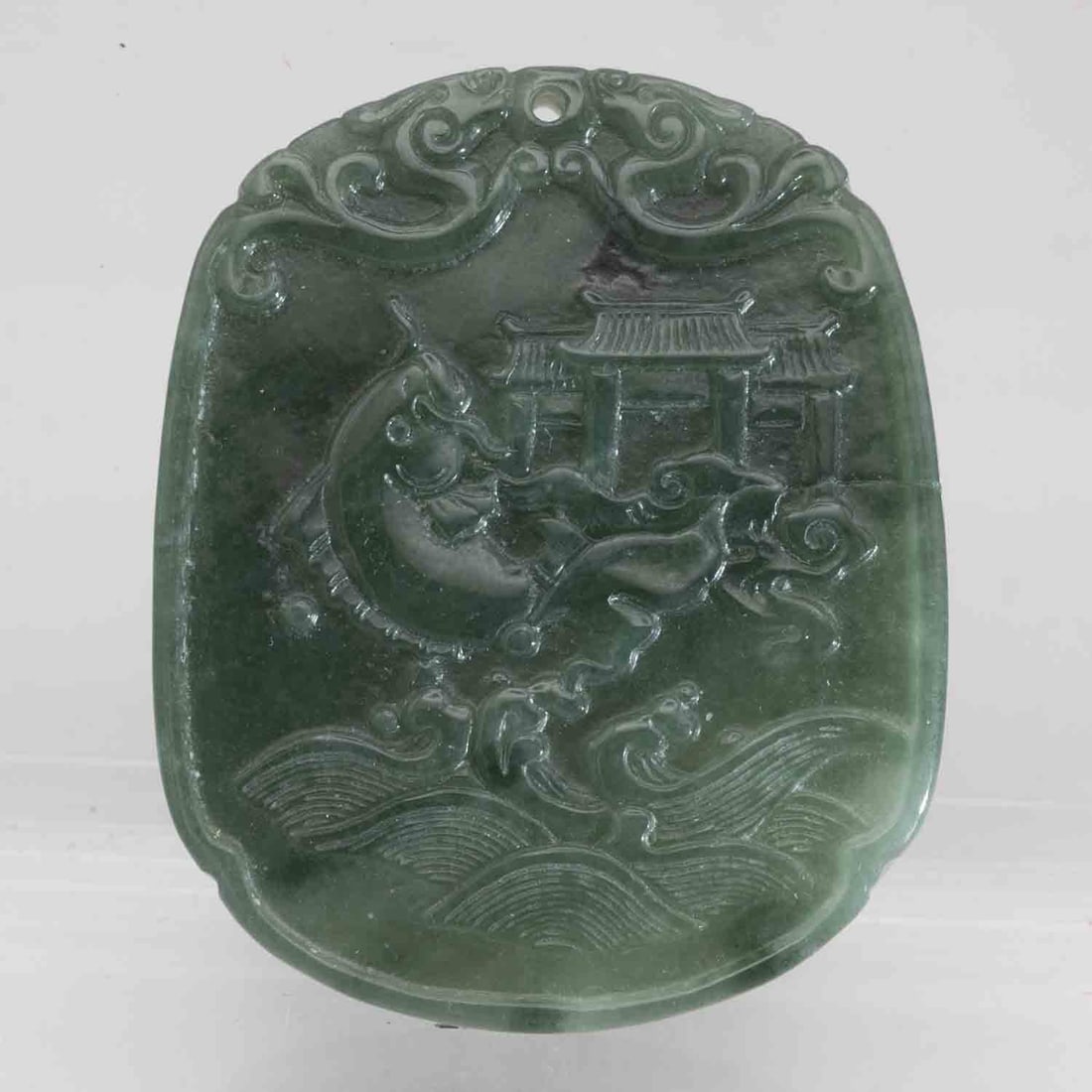 Chinese Carved Natural Green Jadeite Koi Over Dragon Gate Pendant: Medium: Natural Green Jadeite Size: 2x1.6x0.3 inches Age/Detail: Chinese Carved Condition: great overall, check photo for condition reference. Provenance: Collection from Estate in Tribecca Please vie
