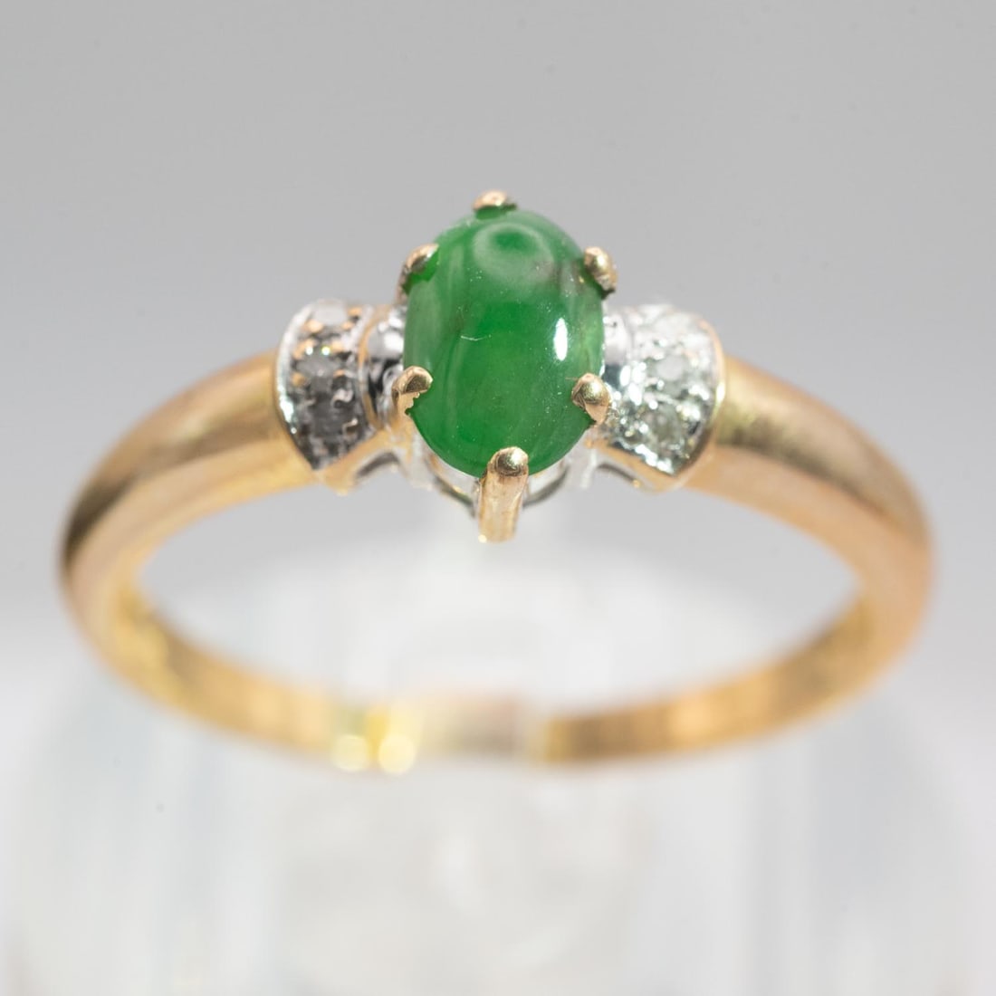 14k Gold Natural Icy Green Jade Cabochon Ring: Medium: Natural Icy Green Jade Cabochon Size: US7, 2.4gram Age/Detail: 14k Gold Condition: great overall, check photo for condition reference. Provenance: Collection from Estate in Williamsburg