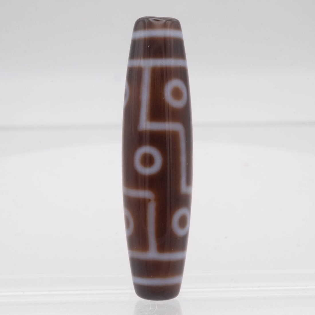 Chinese Tibetan Dzi Bead Pendant: Medium: Dzi Bead Size: 2.3x0.5 inches Age/Detail: Chinese Tibetan Condition: great overall, check photo for condition reference. Provenance: Collection from Estate in Tribecca Please view all the phot