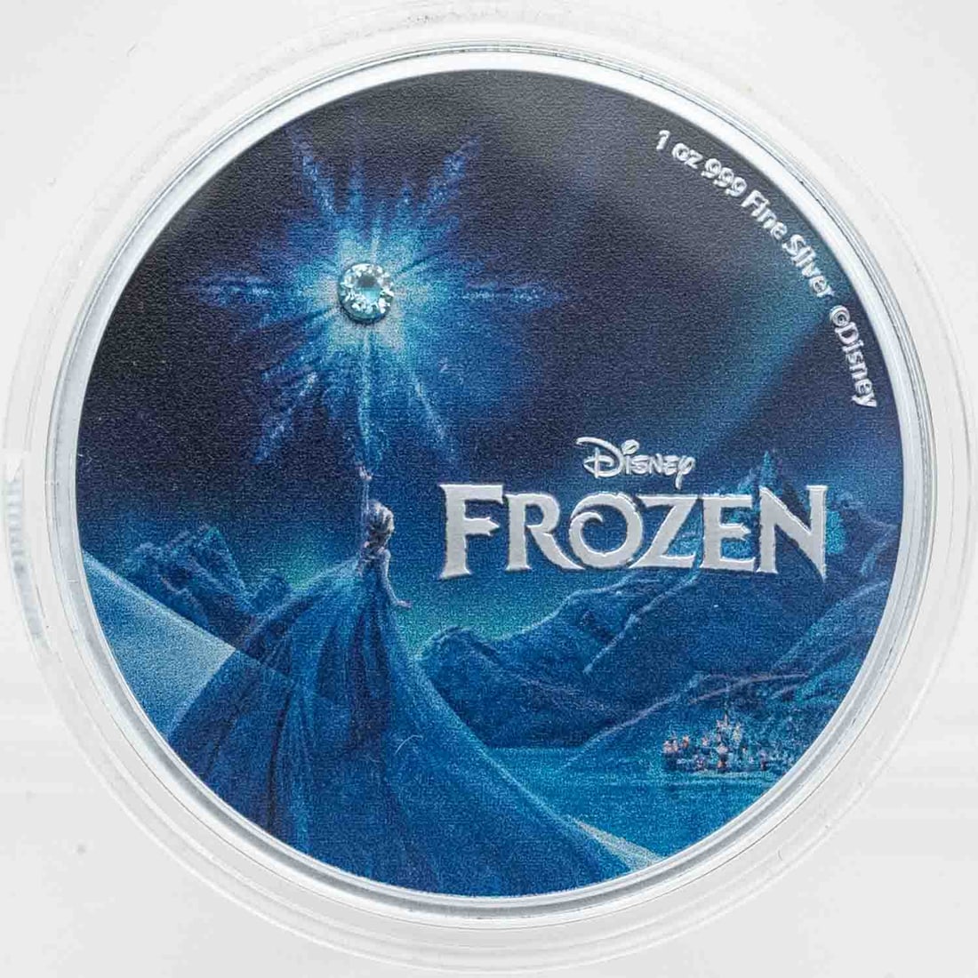 2023 Disney Frozen 10 Year Anniversary Colorized 1oz Silver Coin With Crystal Box COA: MLC01419 Provenance: Acquired from reputable coin dealers. Subject: Disney Frozen 10 Year Anniversary Colorized 1oz Silver Coin With Crystal Box COA Medium: 999 SIlver Year: 2023 Condition: BU, 2013 m