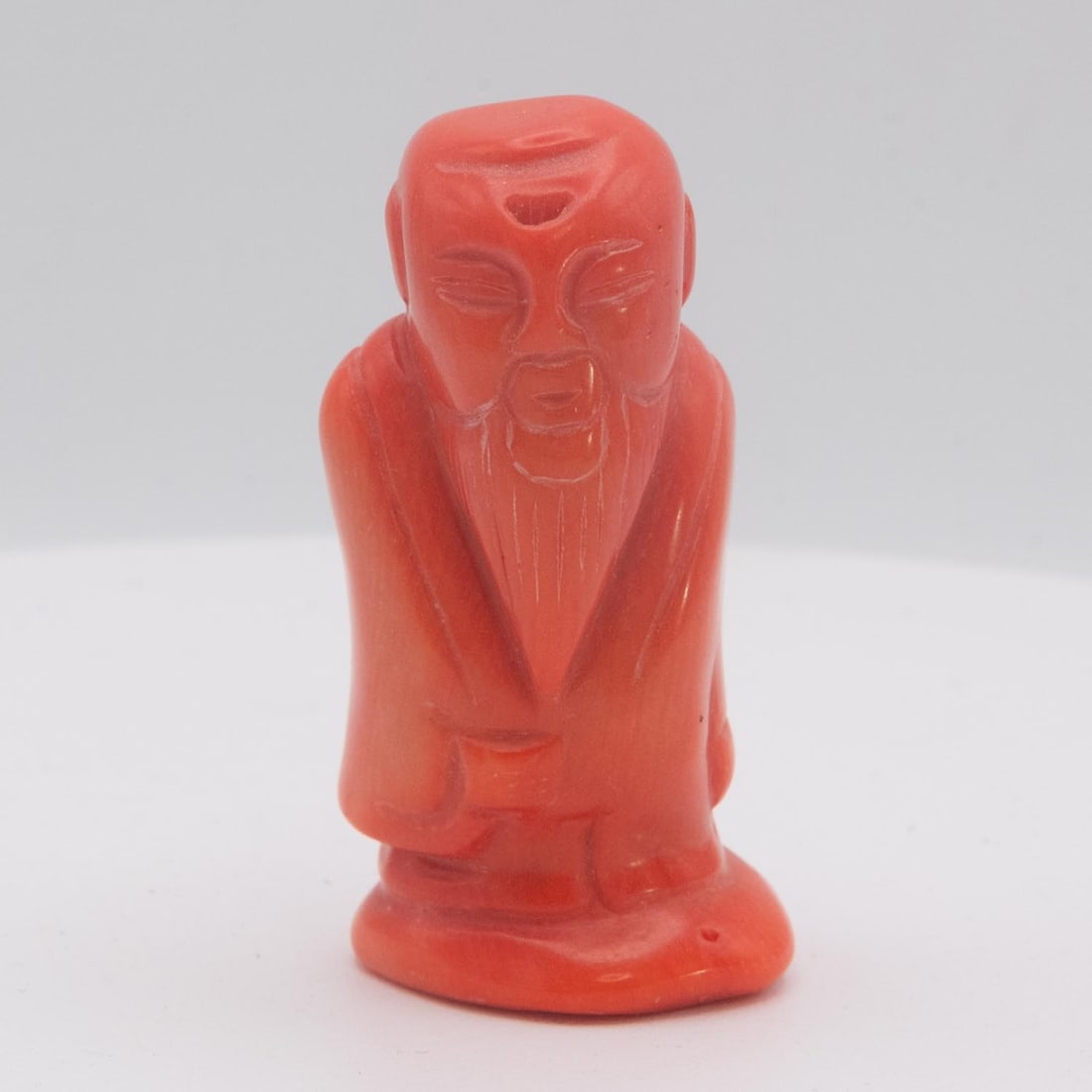 Old Chinese Carved Red Coral Man Figure: Medium: Red Coral Size: 2.5x1.3x1 inches Age/Detail: Old Chinese Carved Condition: great overall, check photo for condition reference. Provenance: Collection from Estate in Williamsburg Please view al
