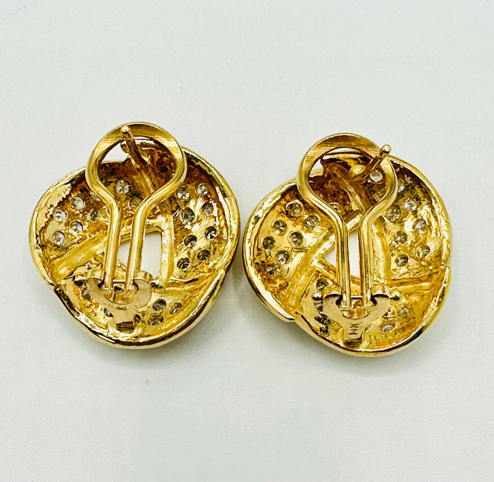 Pair of Natural Diamond Earrings, 14KT Yellow Gold # 2411: # 2411 Pair of Natural Diamond Earrings, 14KT Yellow Gold 54 pieces diamond 1.25 carats ( t.w.) Omega backs Earrings Weight: 11.00 grams(t.w.) Earrings Size: 21 mm x 21 mm