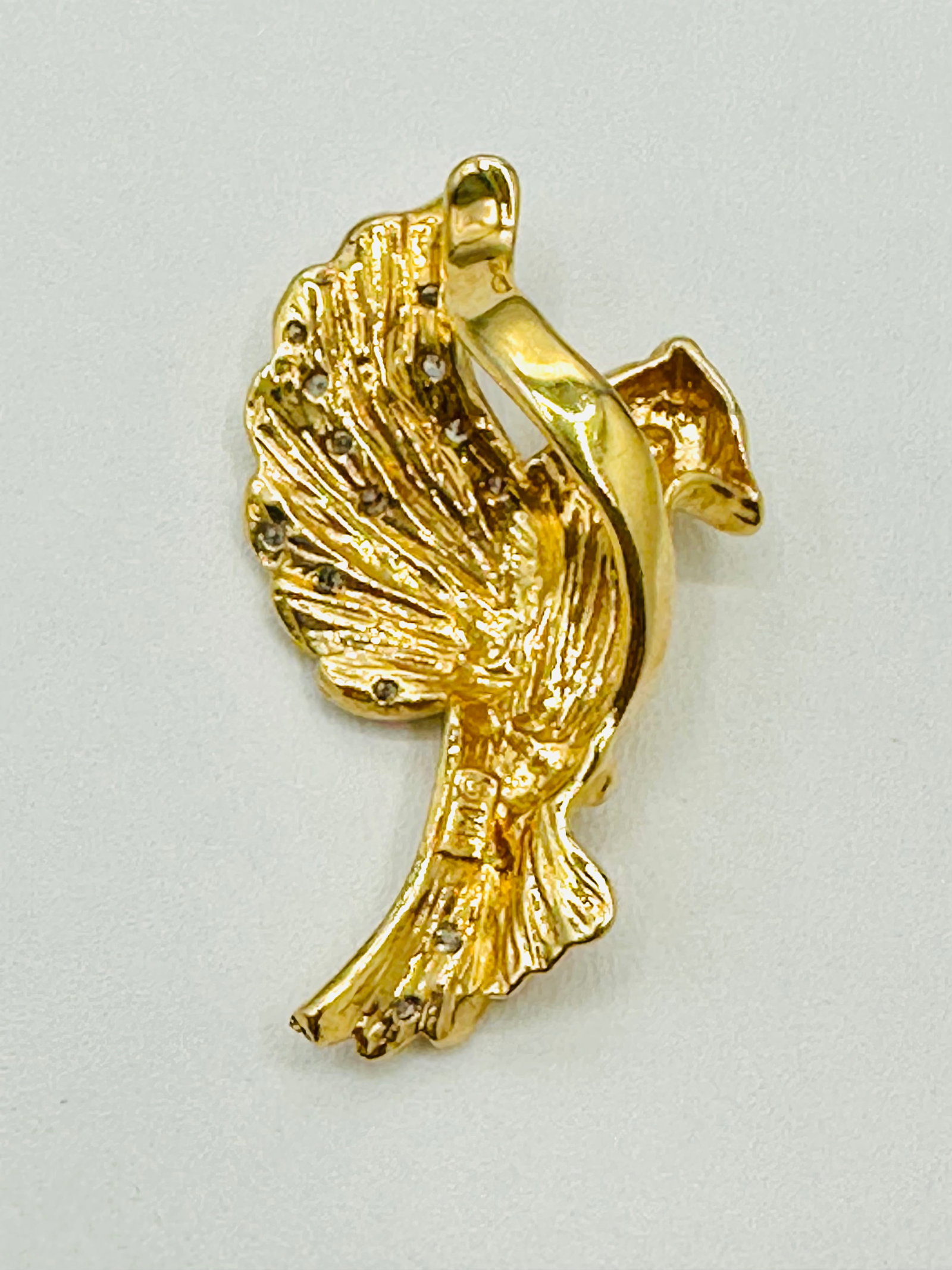 Pair of Natural Diamond Pendant 14KT Yellow Gold # 2427: # 2427 Pair of Natural Diamond Pendant 14KT Yellow Gold 15 pieces diamond 0.10 carat( t.w.) Pendant Weight: 5.20 grams(t.w.) Pendant Size: 31 mm x 18 mm