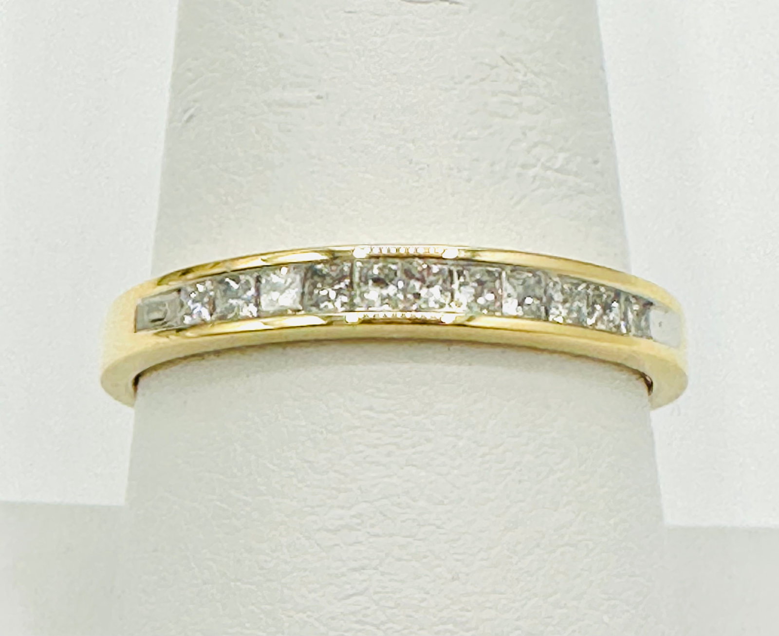 Natural Diamond Band 14KT Yellow Gold # 2430: # 2430 Natural Diamond Band 14KT Yellow Gold 11 pieces princess diamond 0.30 carat(t.w.) Ring Weight: 2.90 grams(t.w.) Ring Size: 9