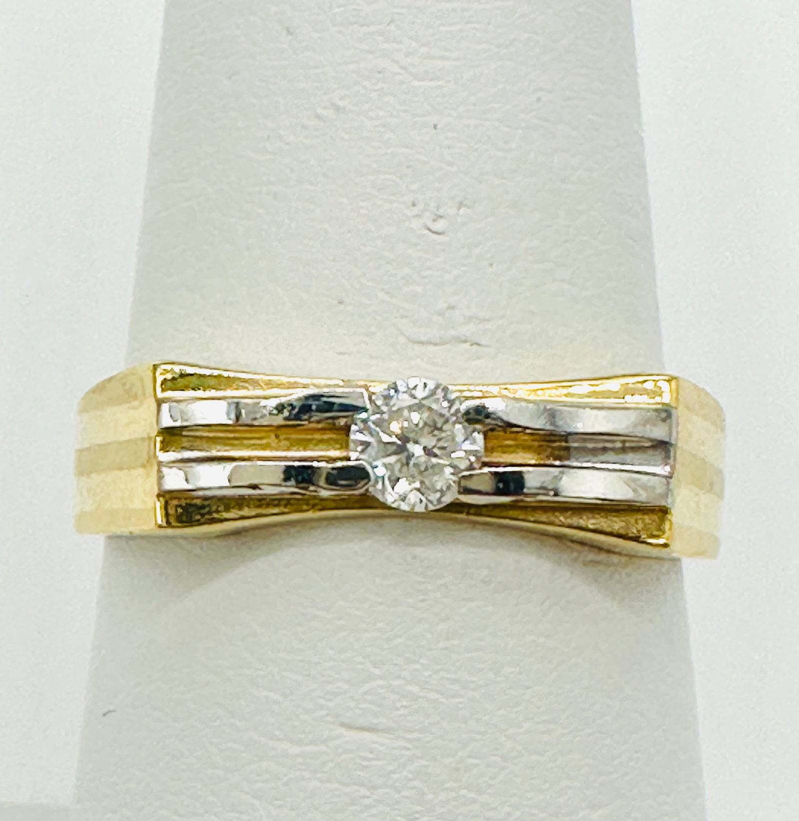 Natural Diamond Ring,14KT 2-Tone Gold # 2431: # 2431 Natural Diamond Ring,14KT 2-Tone Gold 1 piece diamond 0.19 carat Ring Weight: 2.60 grams(t.w.) Ring Size: 7.25