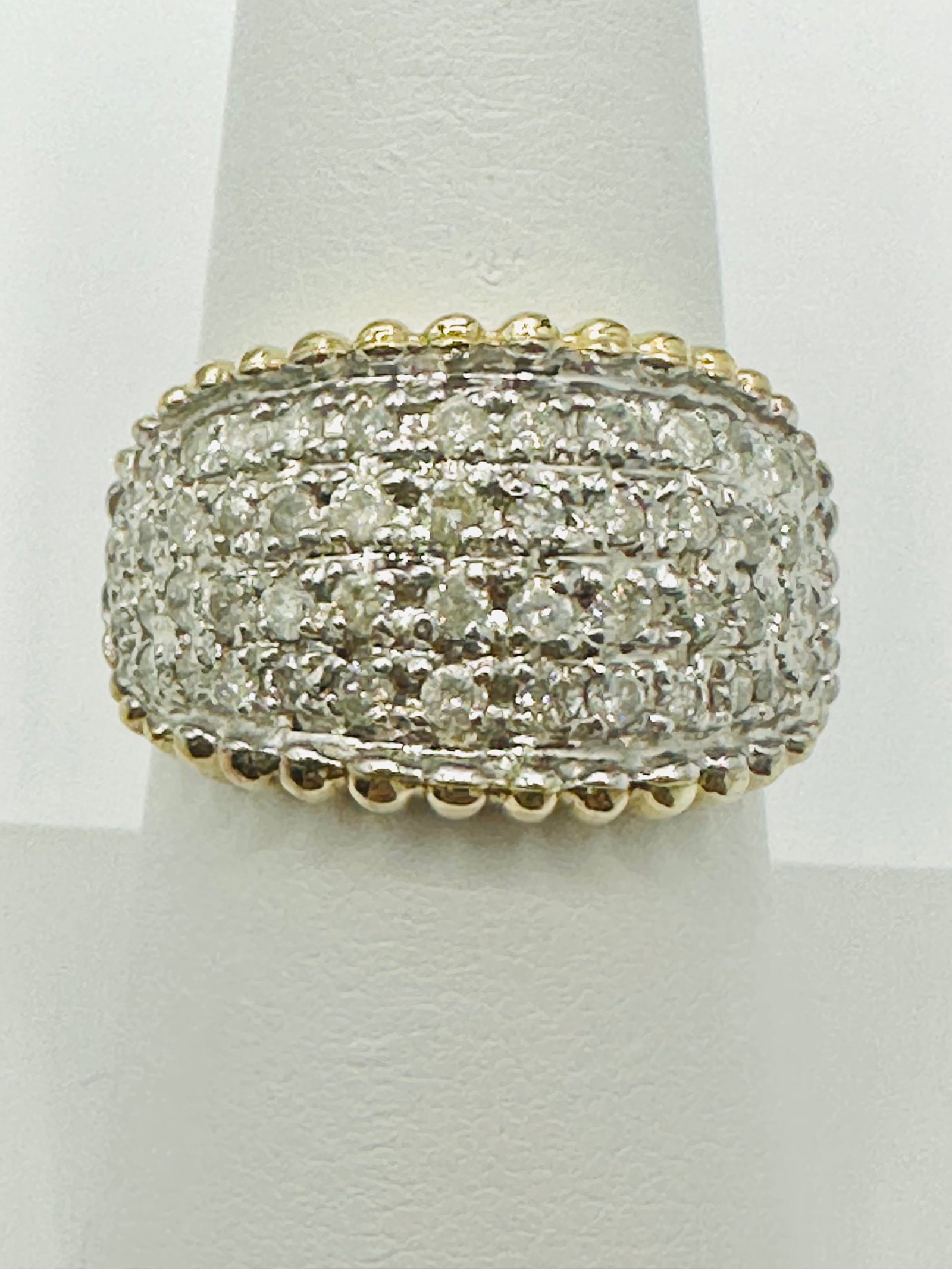 Natural Diamond Multi Row Ring,10KT Yellow Gold # 2461: # 2461 Natural Diamond Multi Row Ring,10KT Yellow Gold 54 pieces diamond 1.20 carats(t.w.) Ring Weight: 4.90 grams(t.w.) Ring Size: 6