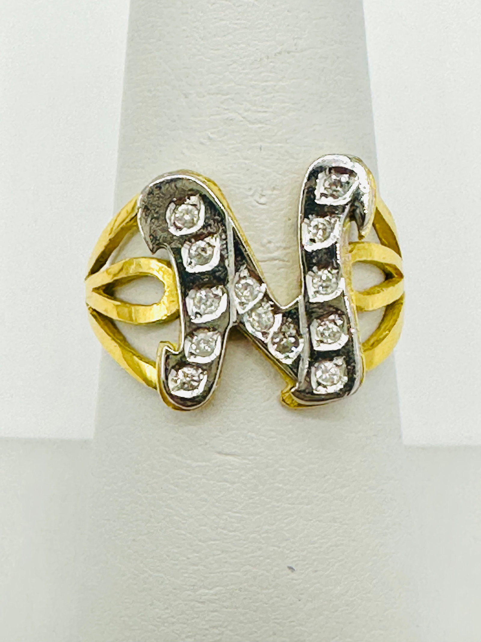 Natural Diamond Initial N Ring,18KT Yellow and White Gold # 2480: # 2480 Natural Diamond Initial N Ring,18KT Yellow and White Gold 13 pieces diamond 0.20 carat(t.w.) Ring Weight: 4.70 grams(t.w.) Ring Size: 7