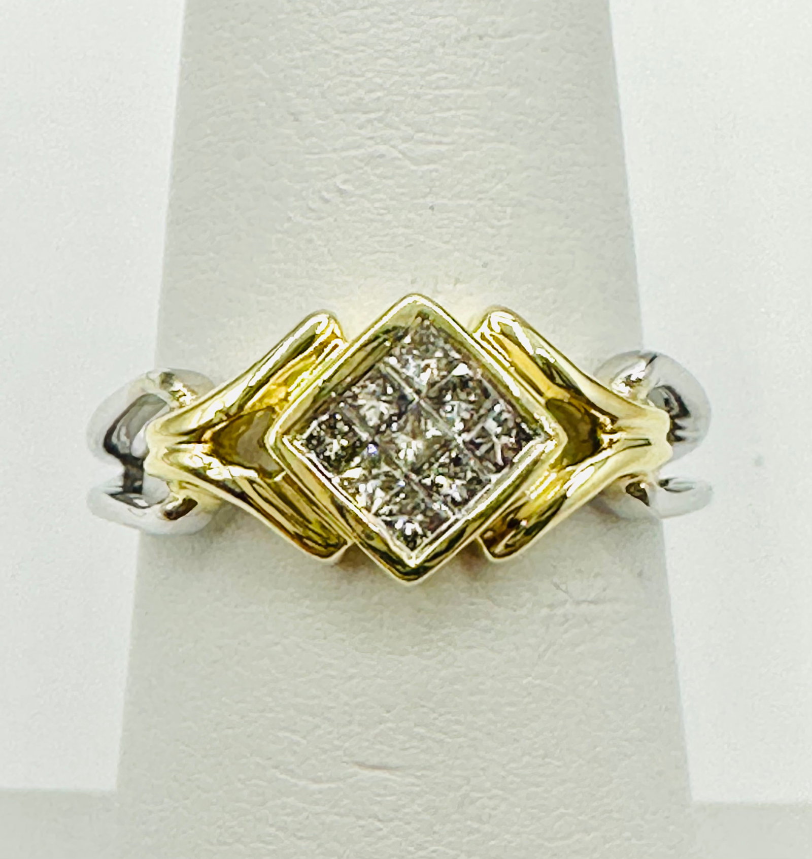 Natural Diamond Ring,14KT Yellow and White Gold # 2495: # 2495 Natural Diamond Ring,14KT Yellow and White Gold 9 pieces princess diamond 0.25 carat(t.w.) Ring Weight: 3.40 grams(t.w.) Ring Size: 6.75