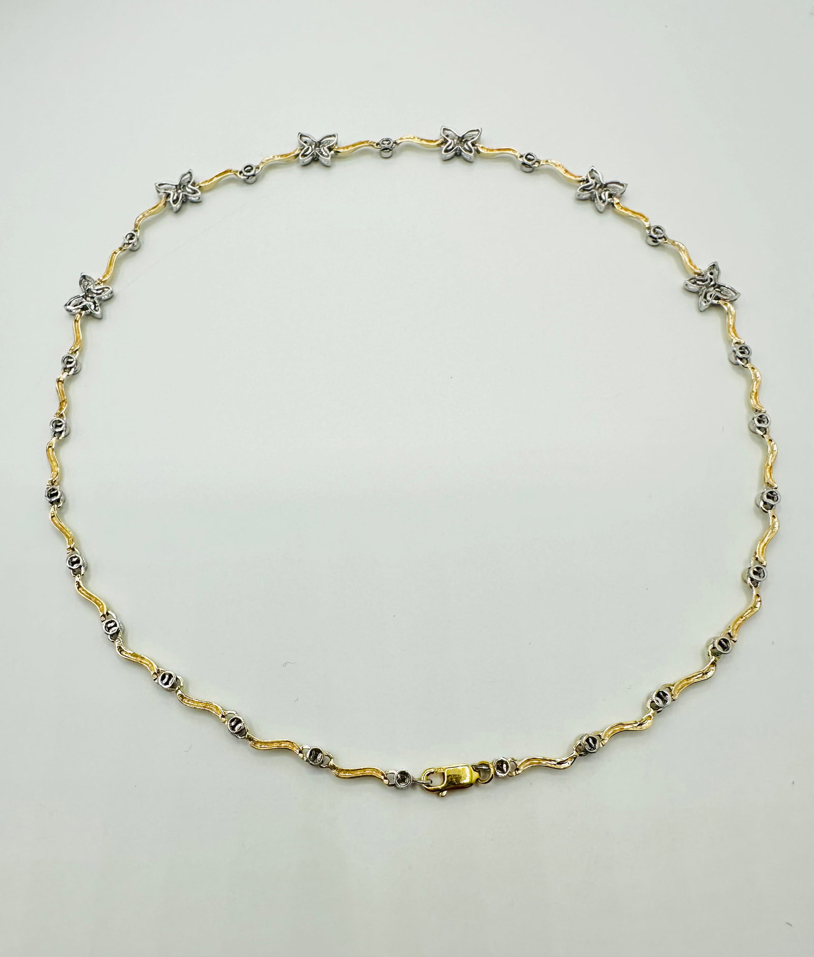 Natural Diamond Necklace, 14KT Yellow and White Gold # 2664: # 2664 Natural Diamond Necklace, 14KT Yellow and White Gold 46 pieces diamond 0.40 carat( t.w.) 17â€? Lobster lock clasp closure Weight: 13.70 grams (t.w.)