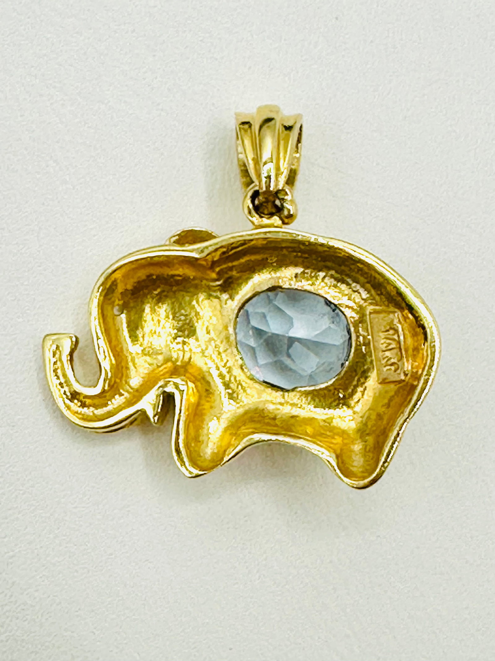 14KT Yellow Gold Elephant Pendant # 2683: # 2683 14KT Yellow Gold Elephant Pendant 1 piece oval stone Weight: 4.00 grams(t.w.) Size: 23 mm X 22 mm
