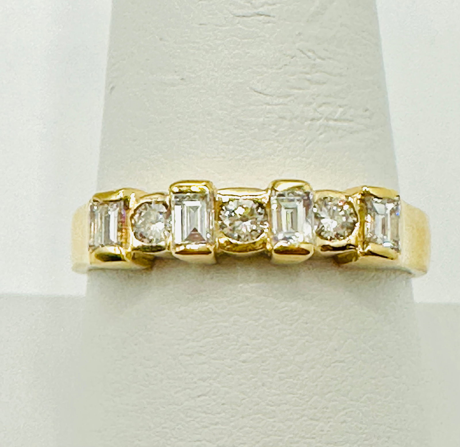 Natural Diamond Ring,14KT Yellow Gold # 2723: # 2723 Natural Diamond Ring,14KT Yellow Gold 7 pieces baguette and round diamond 0.65 carat(t.w.) Ring Weight: 3.80 grams(t.w.) Ring Size: 9.25
